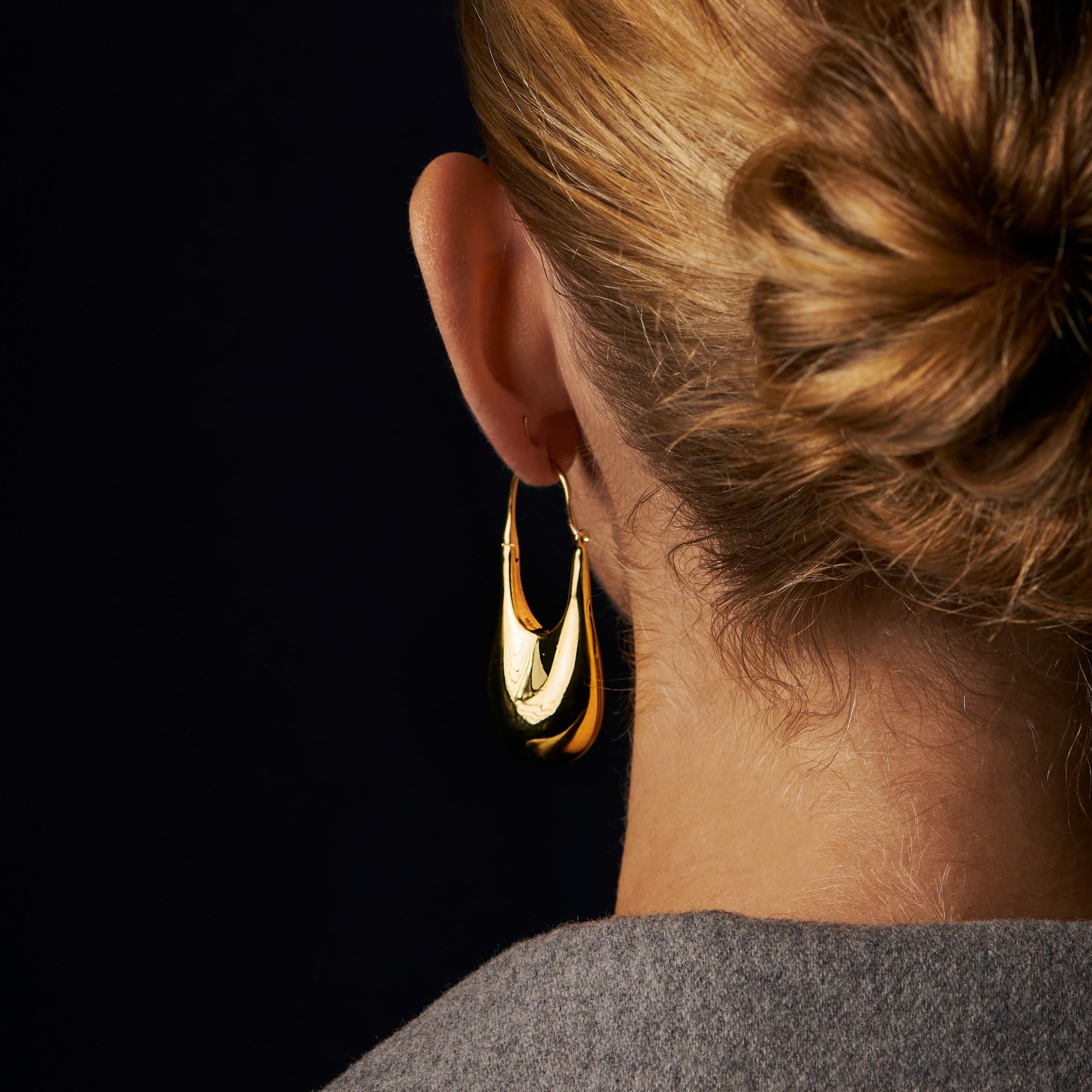 Also available in recycled sterling silver, 18k gold with MPINGO Blackwood, as well as in small size.

This statement earring collection arose from a design collaboration between KINRADEN and Danish fashion designer Mark Kenly Domino Tan. Impeccable