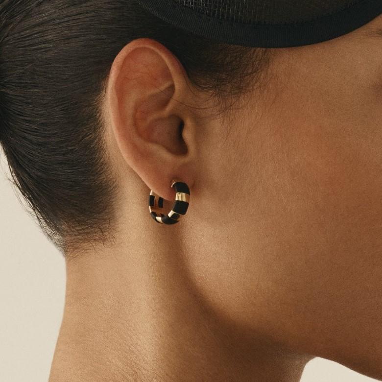 Explore the Two Worlds Collection, a fusion of fine jewellery and Oskar Schlemmer's surreal 