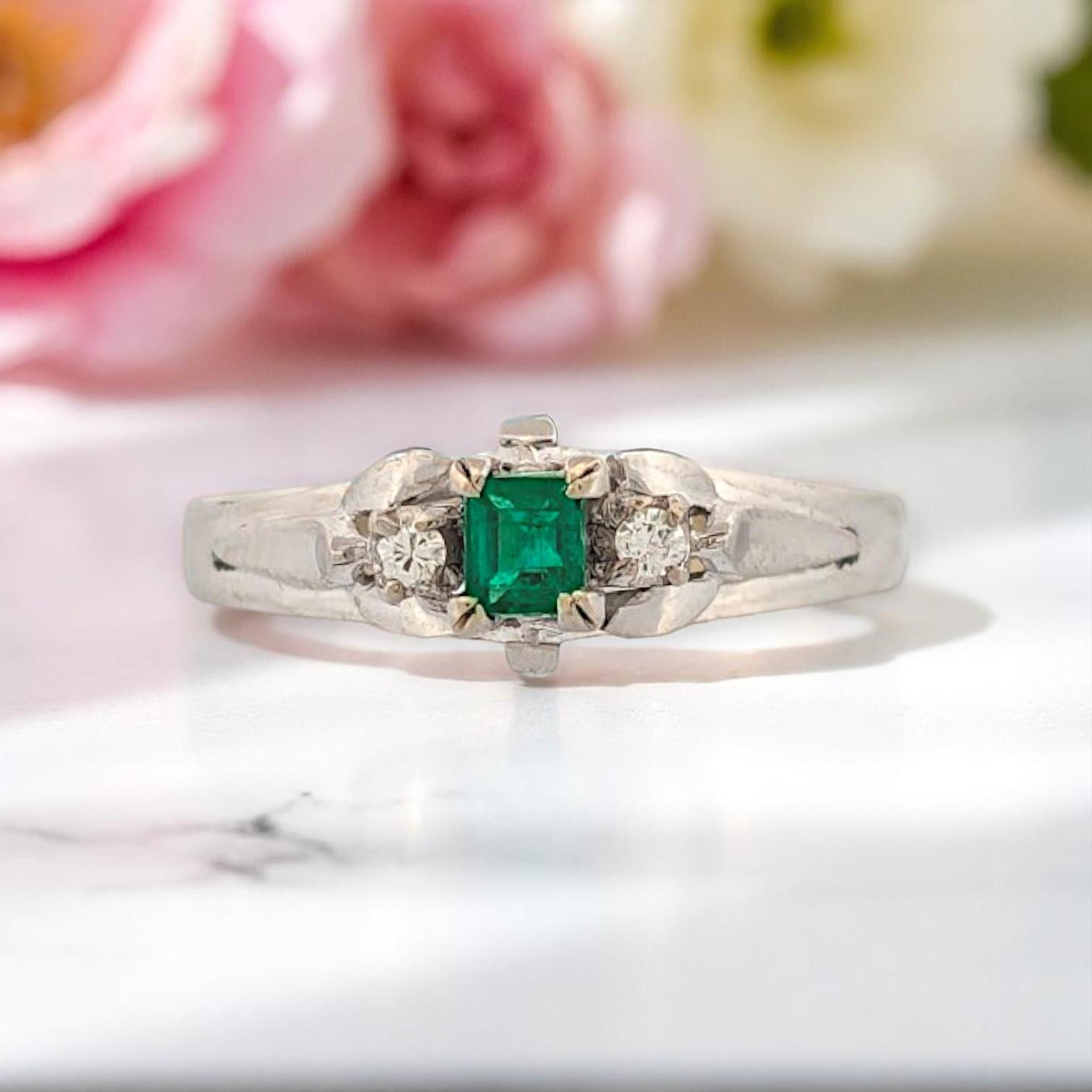 Delicate in form, powerful in presence — the Kinsley Ring by Mountain Song Jeweler is elegance distilled into a luminous design. Handcrafted in sleek 14k white gold, this graceful piece showcases a vivid .35 carat emerald-cut natural emerald,