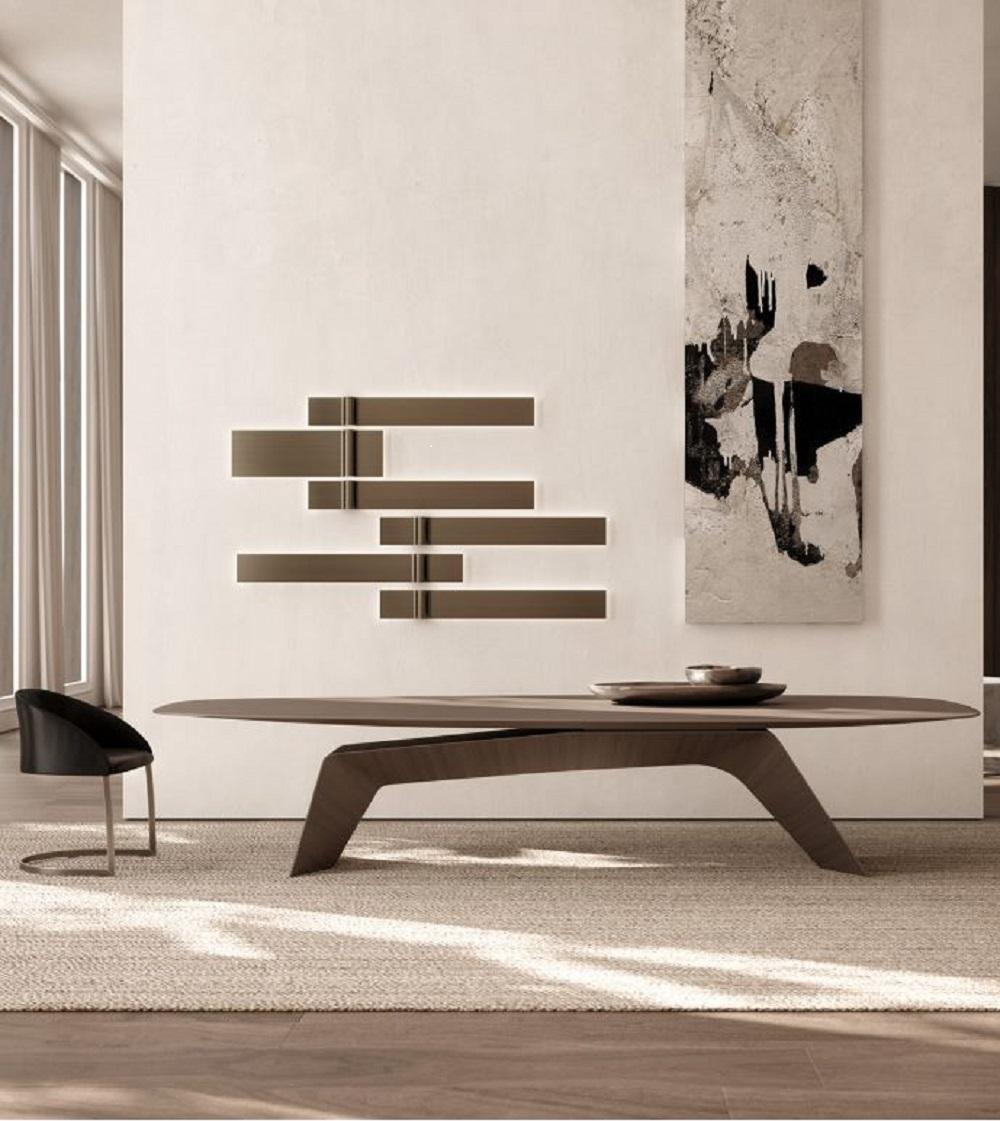 La table Kintai de Ferruccio Laviani pour Emmemobili est un exemple étonnant de design moderne qui allie sculpture et fonctionnalité. Elle fusionne des formes organiques avec la simplicité de l'esthétique orientale et un savoir-faire artisanal