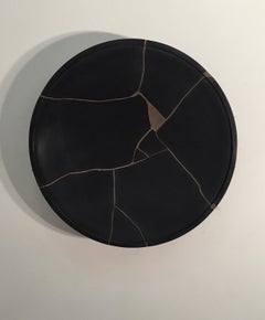 Kintsugi Sound Mirror-a focal wall mounted cast sculpture that alters sound