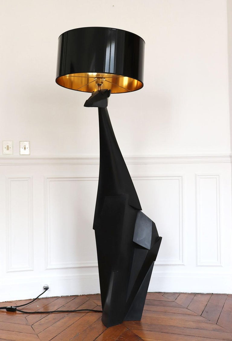 Kiotika is a limited edition bronze sculpture and floor lamp by French contemporary artist Jacques Owczarek. 

The indicated dimensions refer to the sculpture with the lampshade :
* Dimensions of the bronze sculpture : H 128,5 x L 38 x D 63 cm /