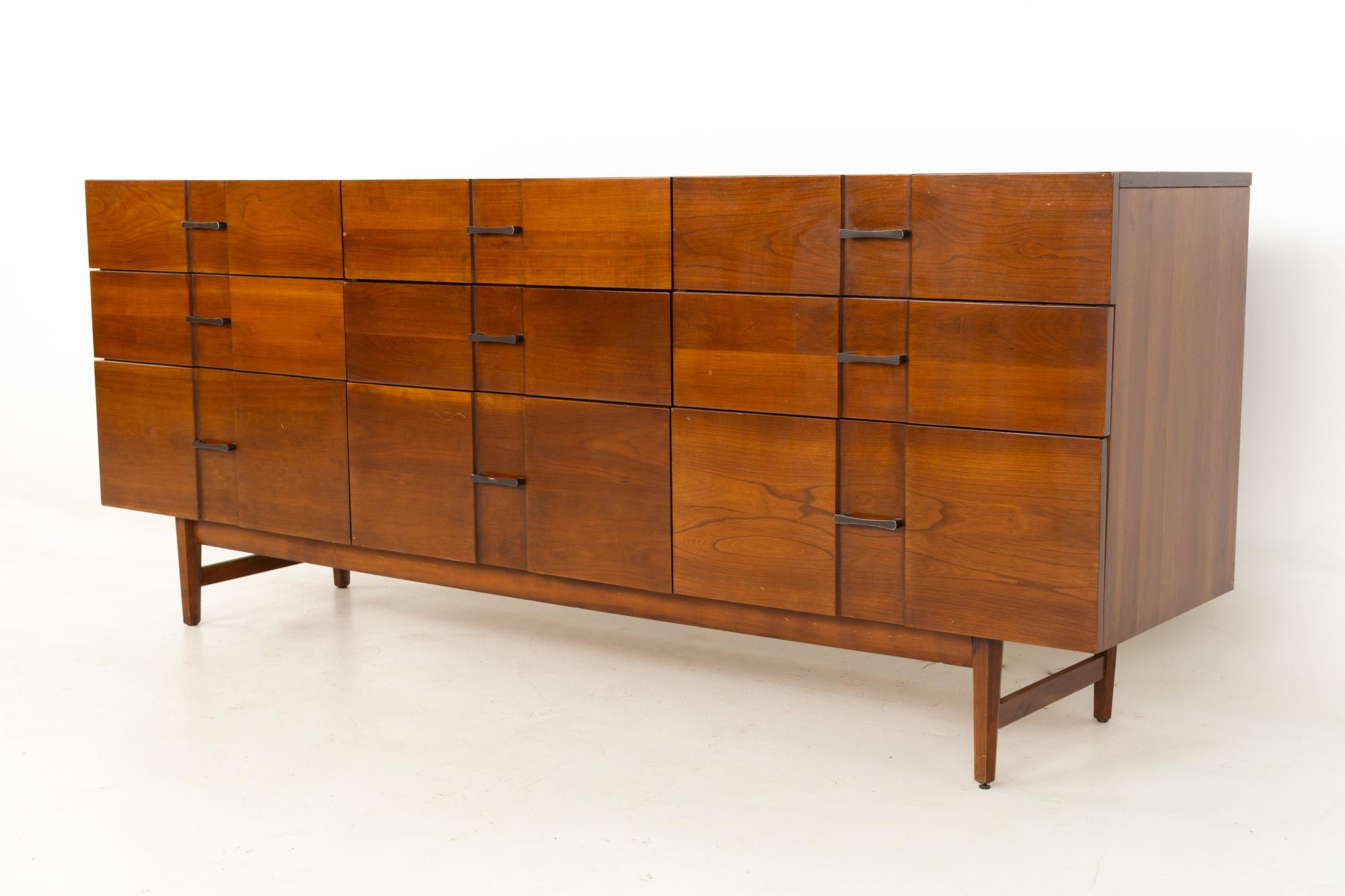 Kipp Stewart for American Design Foundation Group mid century solid cherry 9 drawer lowboy dresser
This piece measures: 72 wide x 18.5 deep x 30 inches high

All pieces of furniture can be had in what we call restored vintage condition. That