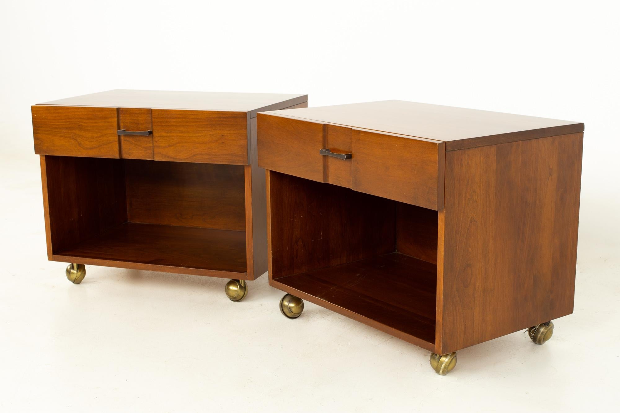 Kipp Stewart American design foundation mid century solid cherrywood nightstands, a pair
Each nightstand measures: 24 wide x 17 deep x 20 inches high

All pieces of furniture can be had in what we call restored vintage condition. That means the