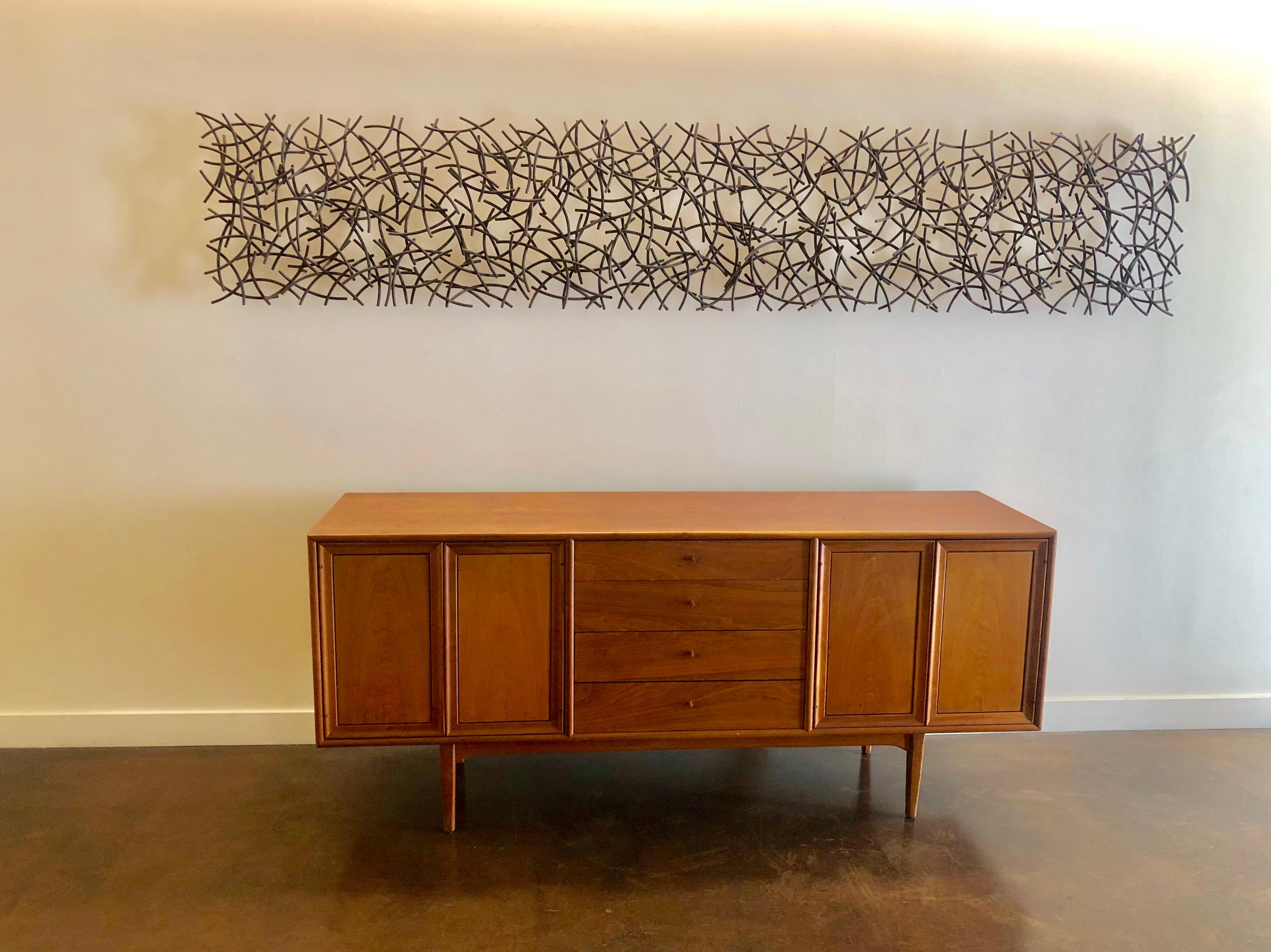 Kipp Stewart and Stewart MacDougal walnut large credenza from Drexel refinished, part of the Declaration line, circa 1950s. Double door compartment on each side plenty of storage and record compartment.