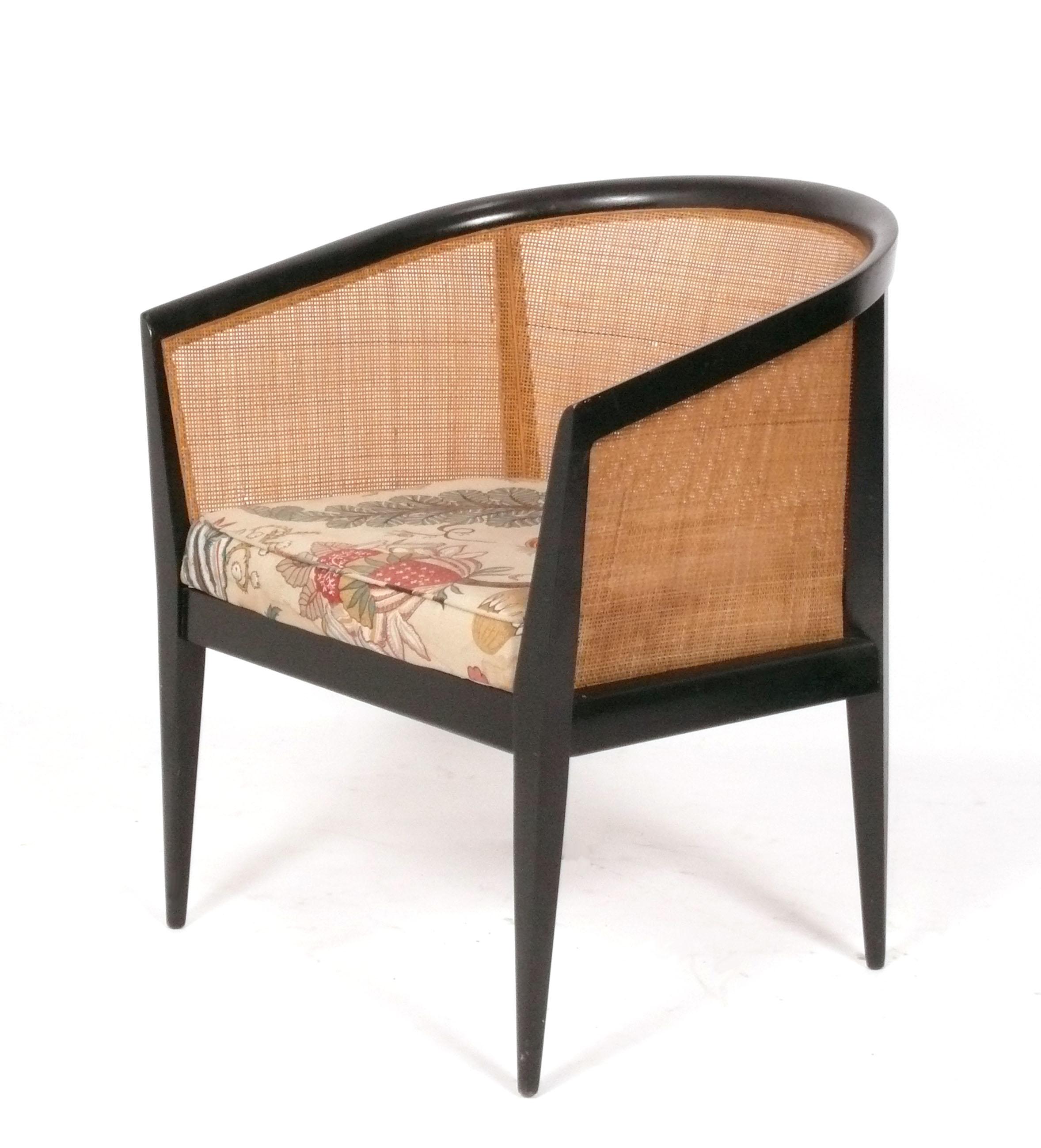 Curvaceous Pair of Mid Century Modern Lounge Chairs, designed by Kipp Stewart, American, circa 1960s. These chairs are in the process of being completely redone and can be refinished in your choice of color and reupholstered in your fabric. Simply