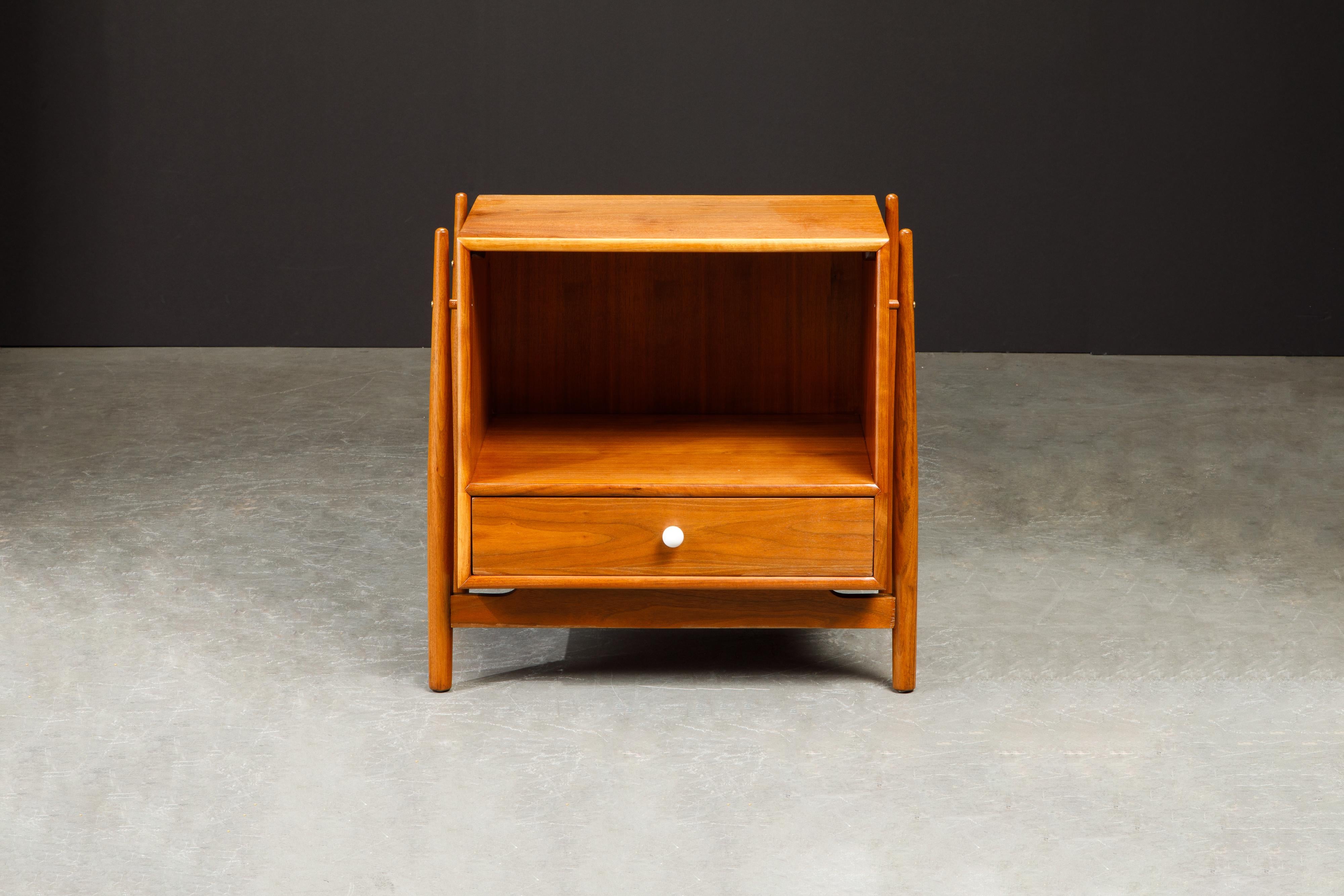 Exceptional refinished 1950's Mid-Century Modern nightstand or can also be used as a side or end table, designed by Kipp Stewart and Stewart McDougall as part of the 'Declaration' line for Drexel furniture. This design being the most coveted and