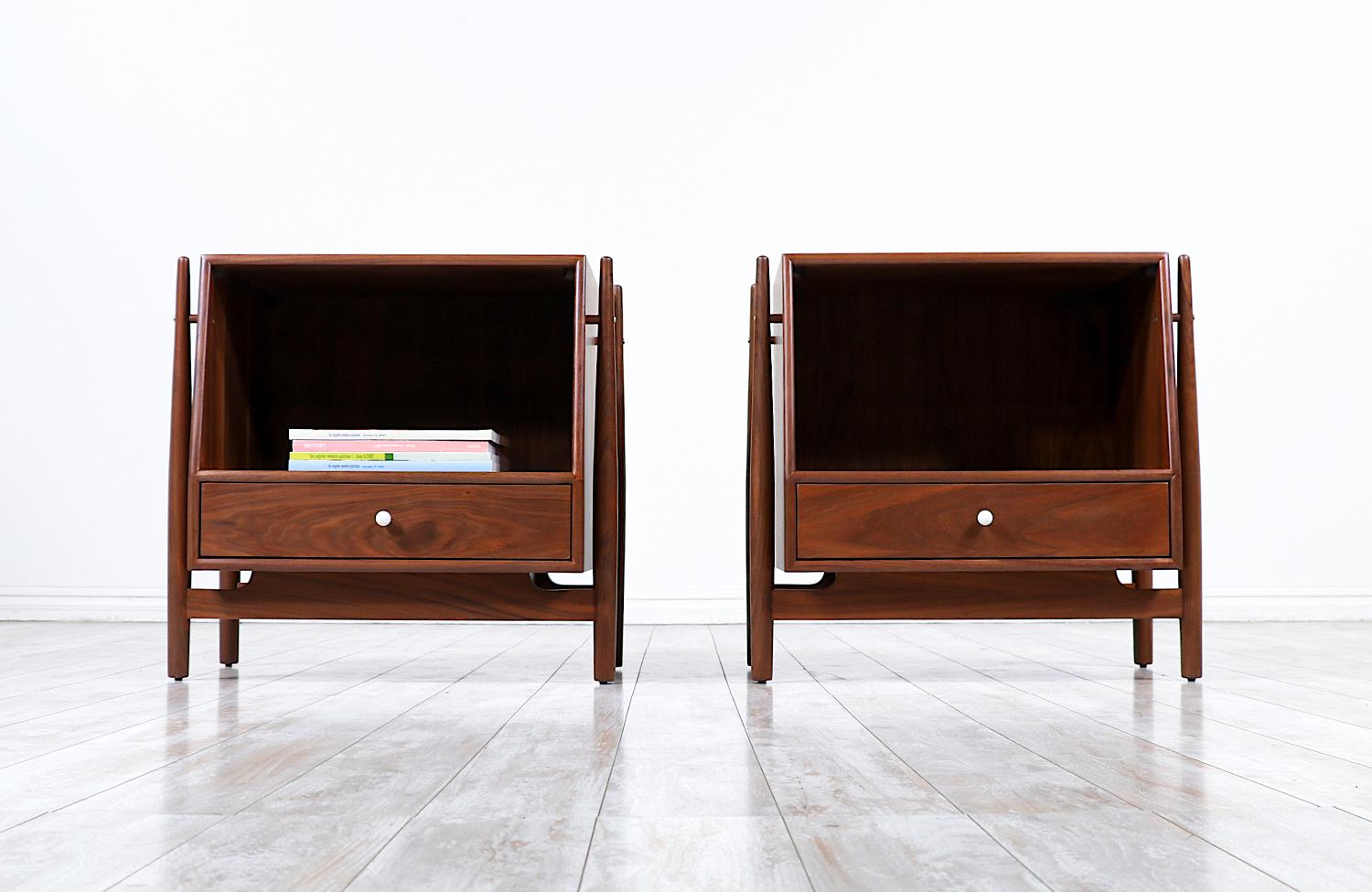 A pair of Mid-Century Modern night stands designed by Kipp Stewart & Stewart MacDougall for Drexel’s ‘Declaration’ line in the United States circa 1960s. Drexel’s ‘Declaration’ iconic collection shows minimalist expressions and a straightforward