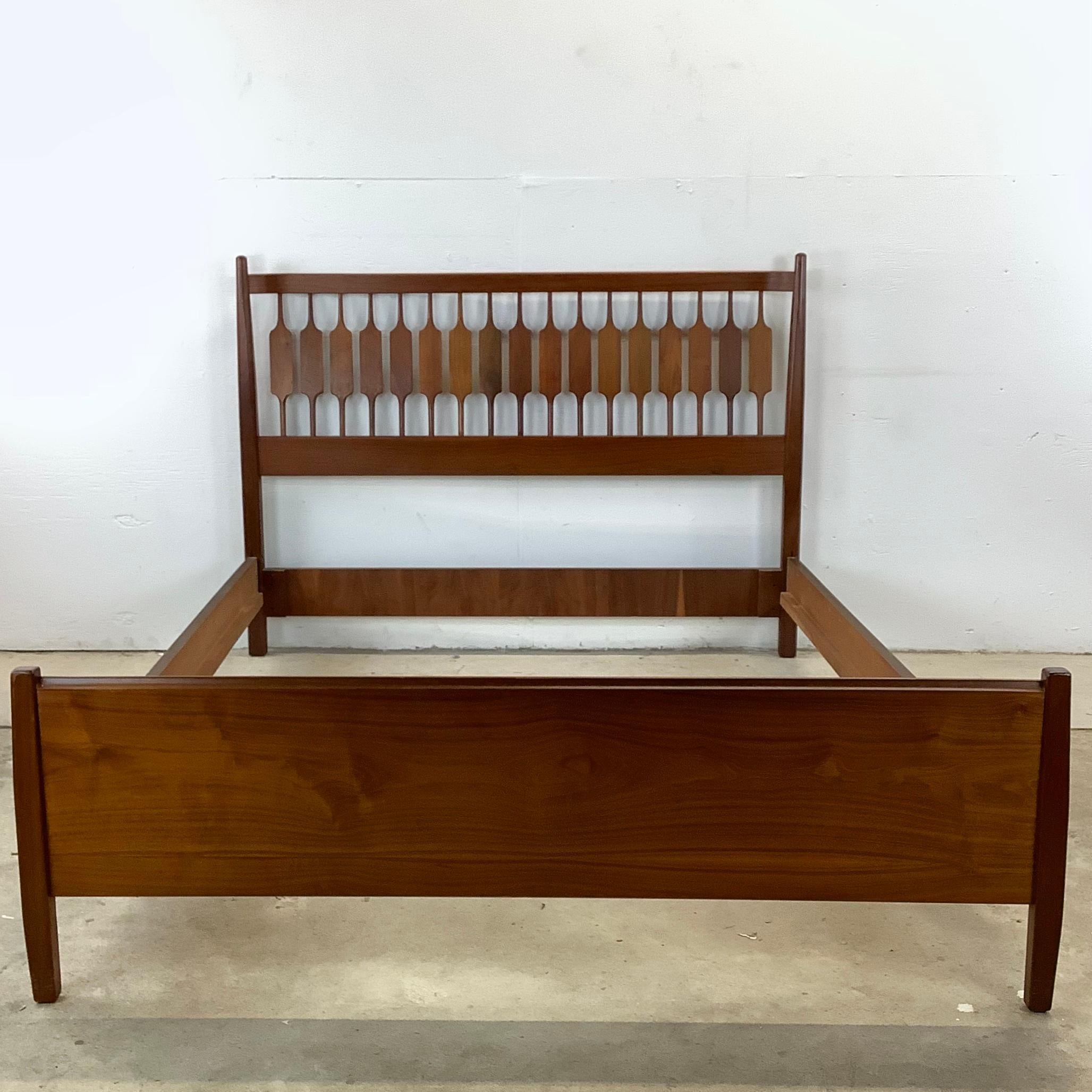 Imbue your bedroom with the spirit of the 1960s Mid-Century Modern era with this solid walnut full size double bed, designed by the distinguished Kipp Stewart for Drexel Furniture. With its sleek lines and warm walnut construction, this bed is a