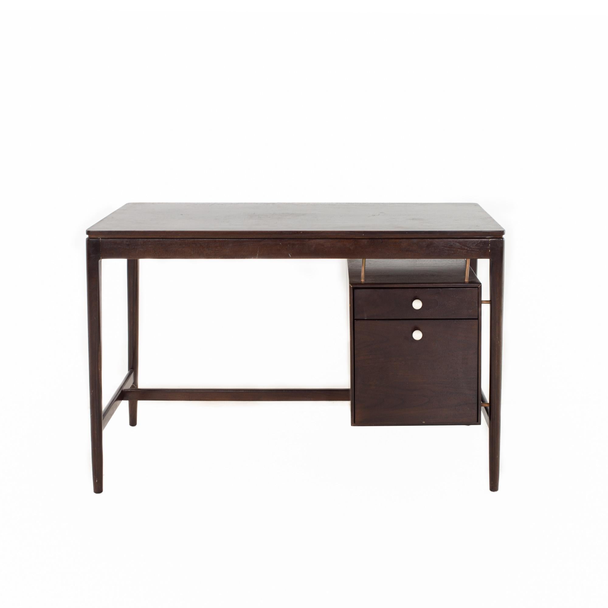 Kipp Stewart Drexel Declaration Mid Century Walnut Writing Desk

The desk measures: 44 wide x 20 deep x 29 inches high

All pieces of furniture can be had in what we call restored vintage condition. That means the piece is restored upon purchase