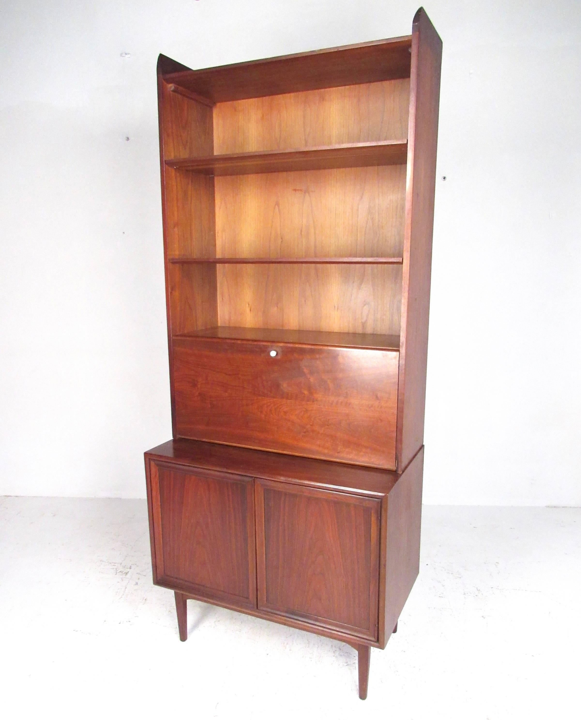 This stylish tall bookcase by Kipp Stewart for the Drexel 