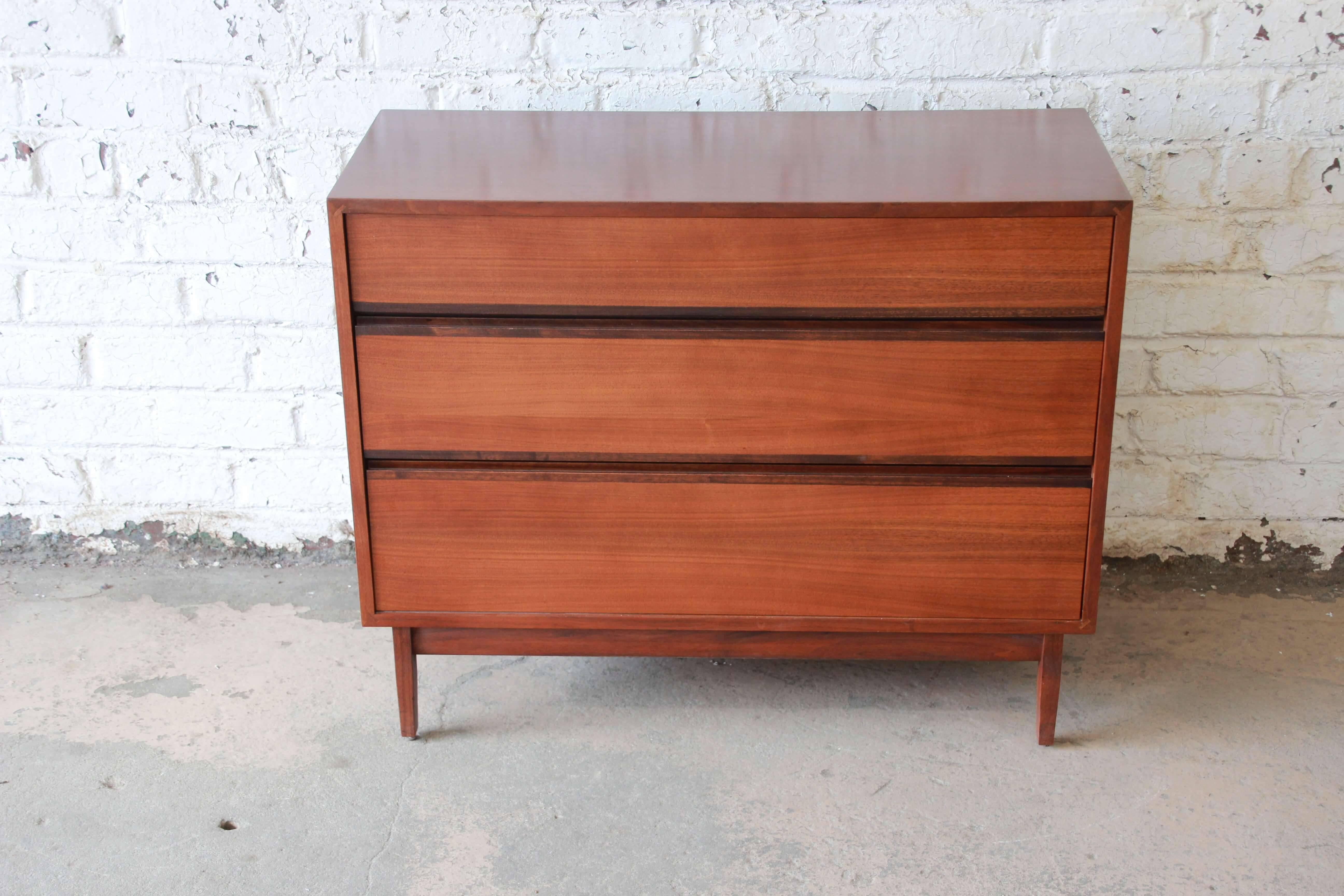 Offering a very nice Kipp Stewart for Calvin Furniture dresser chest. The chest has a nice ebonized sculpted pulls that open up to drawers with dividers that offer ample storage and organization. The dresser is great vintage condition with minor