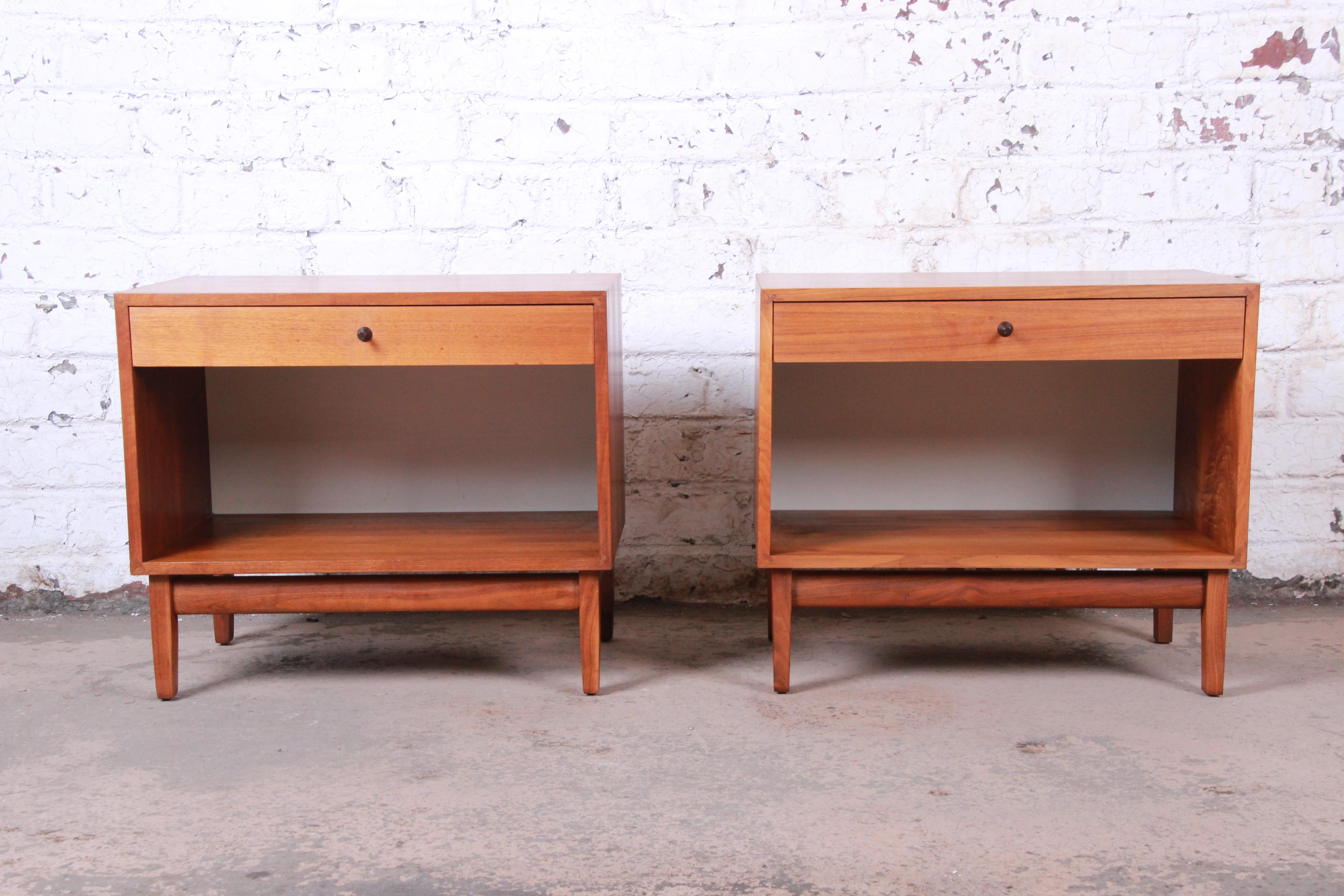 A gorgeous pair of Mid-Century Modern walnut nightstands or end tables

By Kipp Stewart for Calvin Furniture 
