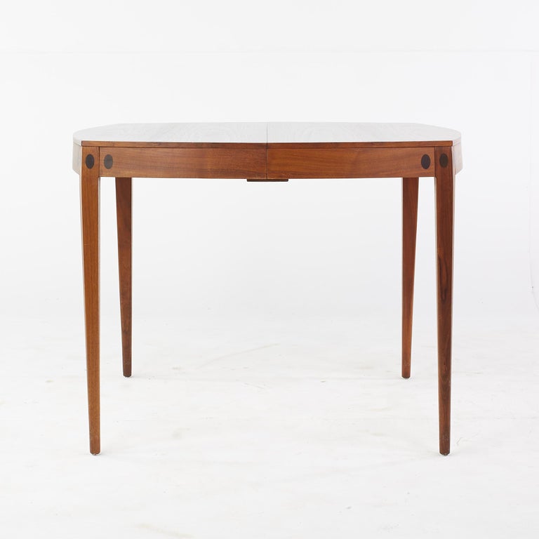 Kipp Stewart for Calvin mid-century inlaid walnut dining table.

This table measures: 39 wide x 39 deep x 29 inches high, with a chair clearance of 26 inches.

All pieces of furniture can be had in what we call restored vintage condition. That