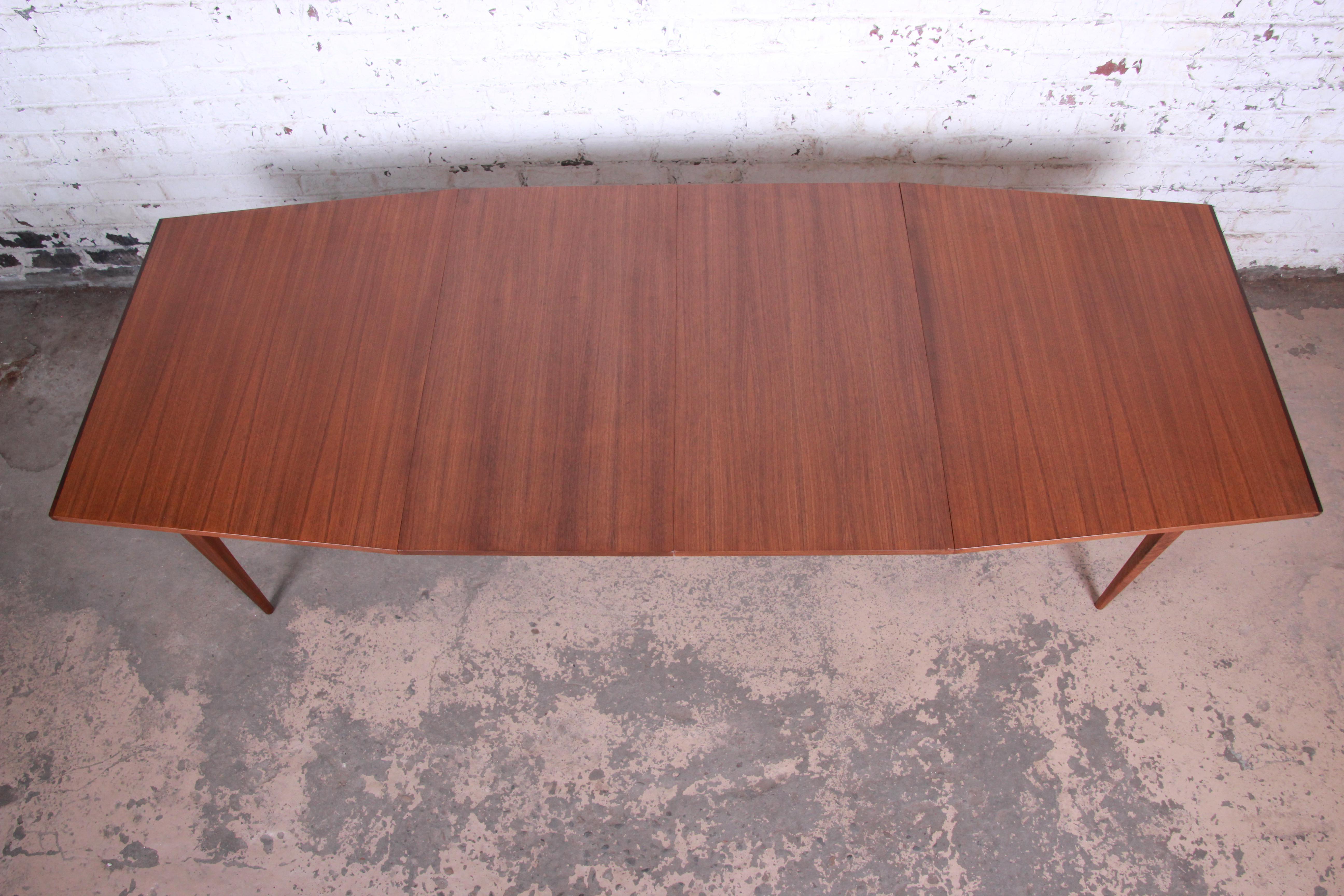 American Kipp Stewart for Calvin Walnut and Rosewood Boat-Shaped Extension Dining Table