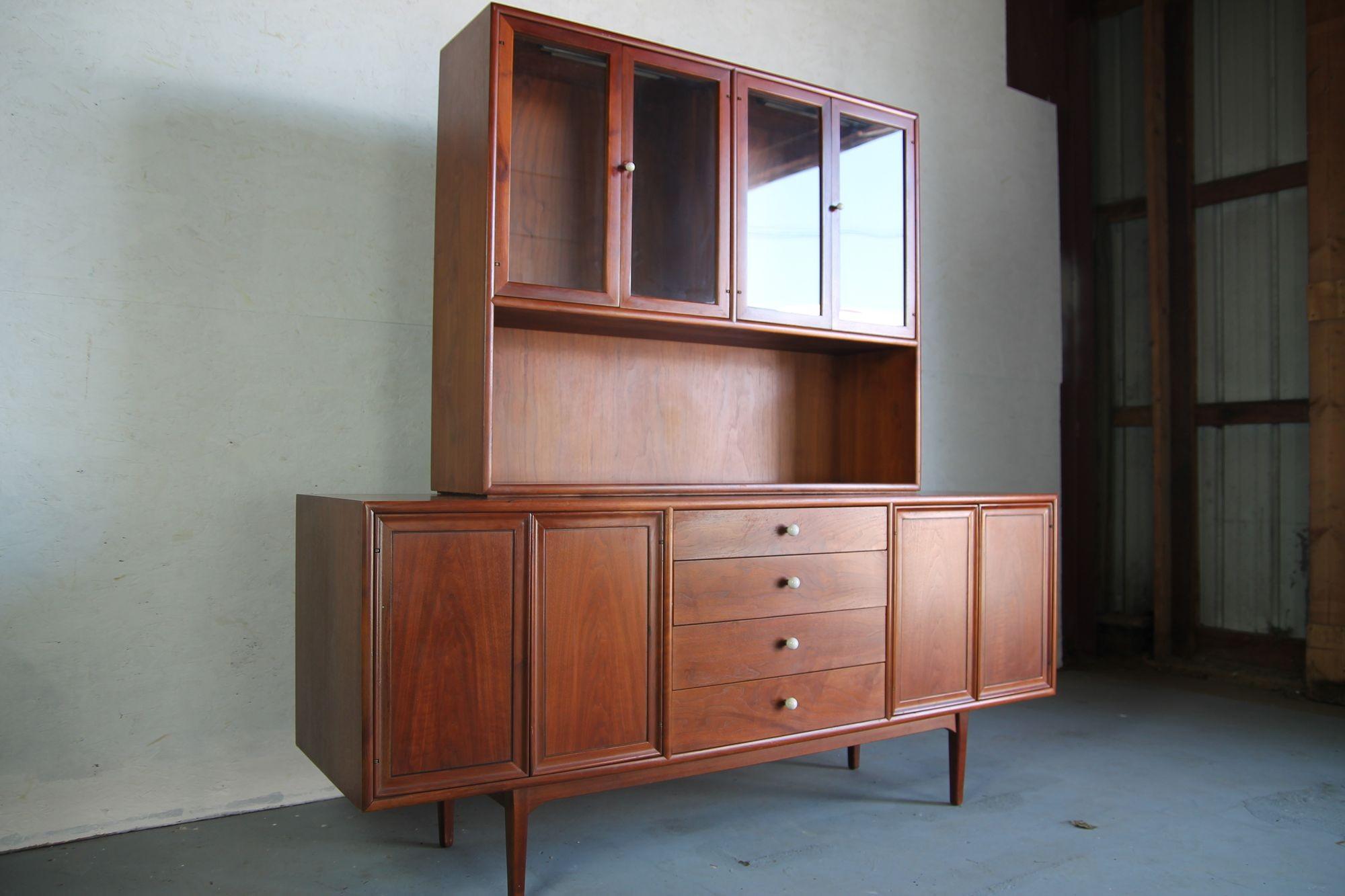 Great credenza and top cabinet my Kipp Stewart for Drexels Declaration line. The cabinet is a separate piece so the credenza can be used as a stand alone piece if desired. This nice 70's piece came from the original owner. In original condition and