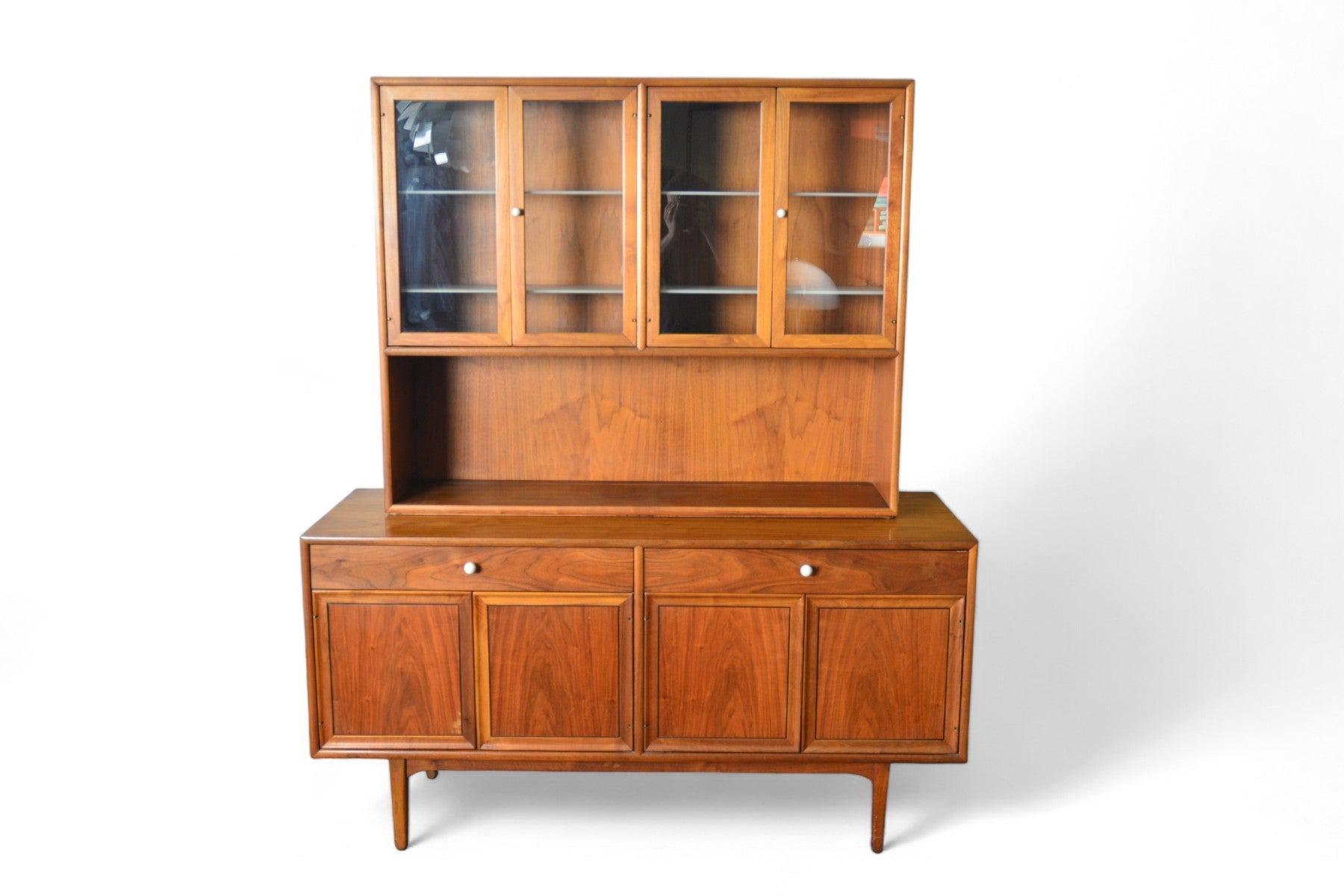 Origin: USA
Designer: Kipp Stewart
Manufacturer: Drexel
Era: 1960s
Materials: Walnut
Measurements: 60″ wide x 20″ deep x 71.25″ tall