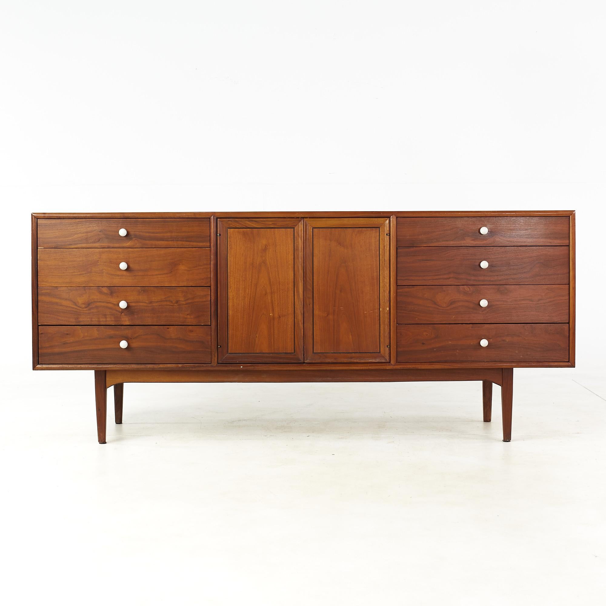 Kipp Stewart for Drexel Declaration Mid Century 11 Drawer Lowboy Dresser

This dresser measures: 72.75 wide x 20 deep x 31.25 inches high

All pieces of furniture can be had in what we call restored vintage condition. That means the piece is