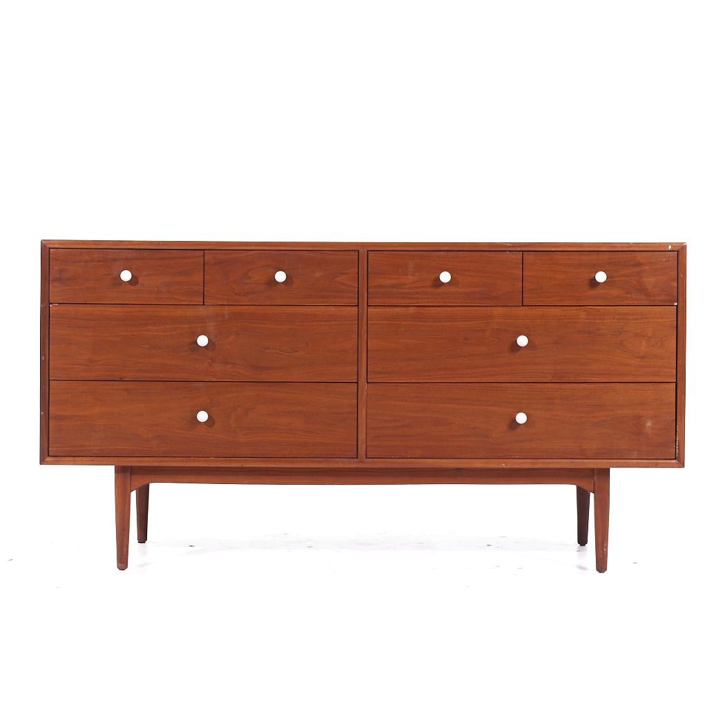 Kipp Stewart for Drexel Declaration Mid Century Walnut 8 Drawer Lowboy Dresser

This lowboy measures: 60 wide x 20 deep x 31.25 inches high

All pieces of furniture can be had in what we call restored vintage condition. That means the piece is