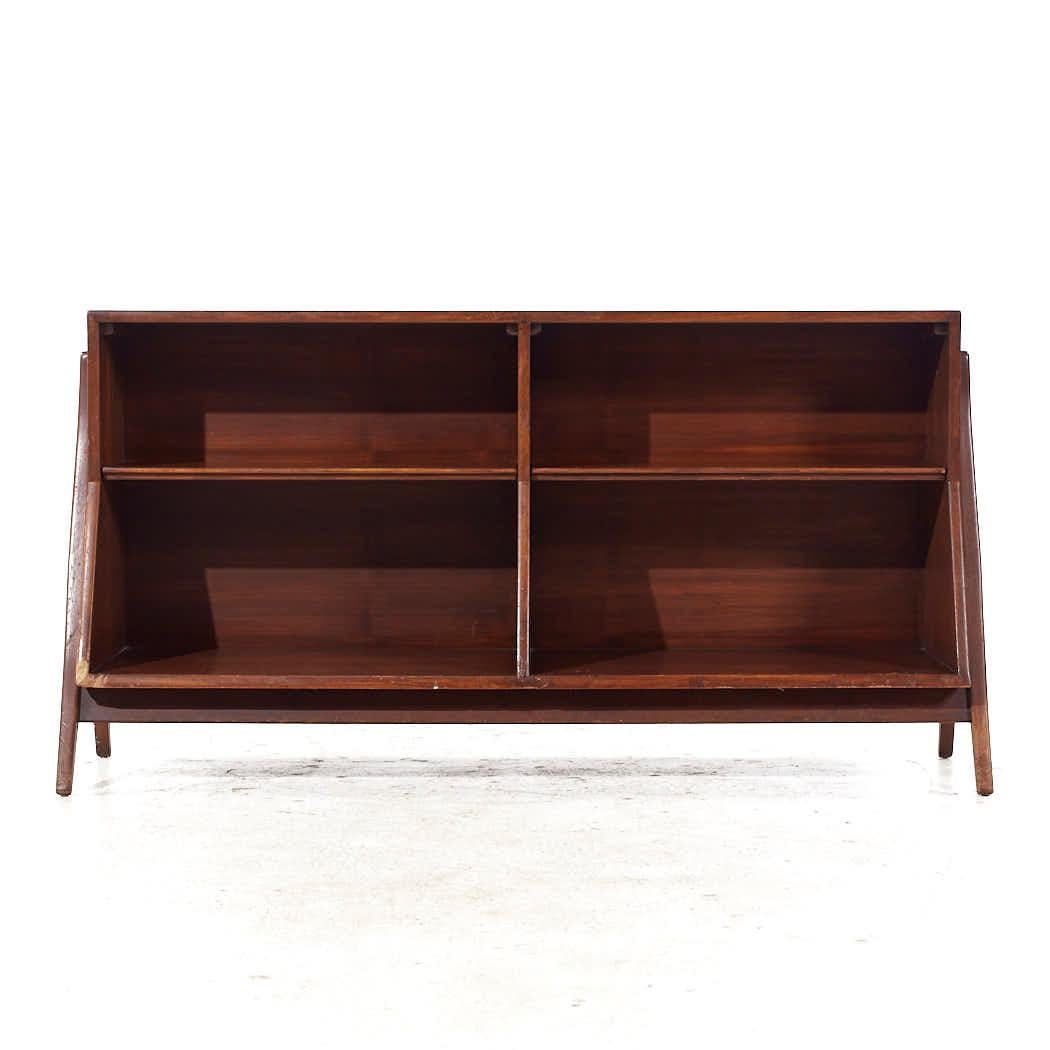 Kipp Stewart for Drexel Declaration Mid Century Walnut Bookcase

This bookcase measures: 59 wide x 17.5 deep x 30.75 inches high

All pieces of furniture can be had in what we call restored vintage condition. That means the piece is restored upon