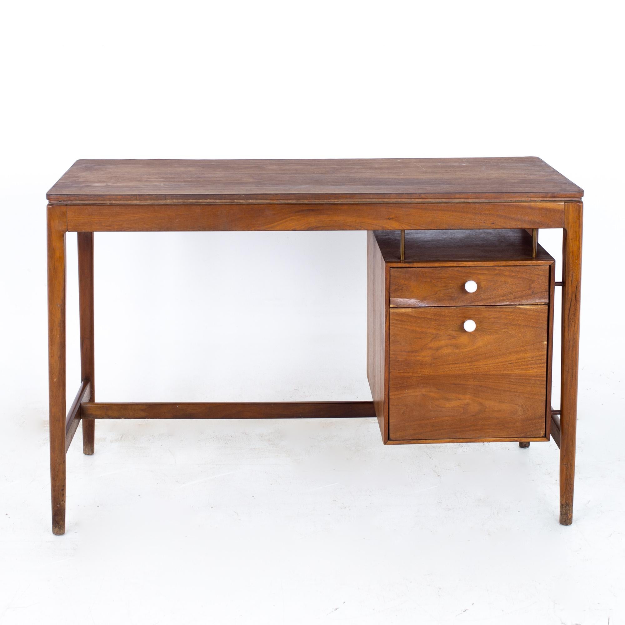 Kipp Stewart for Drexel Declaration Mid Century walnut desk

Desk measures: 44 wide x 20 deep x 29 inches high

All pieces of furniture can be had in what we call restored vintage condition. That means the piece is restored upon purchase so it’s