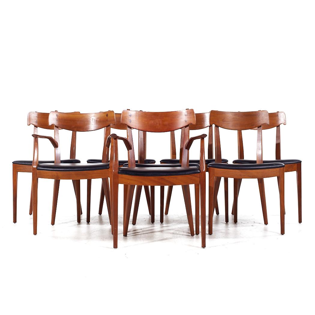 Kipp Stewart for Drexel Declaration Mid Century Walnut Dining Chairs - Set of 8

Each armless chair measures: 19.75 wide x 18.5 deep x 32 high, with a seat height of 17.75 inches
Each captains chair measures: 22 wide x 20 deep x 32 high, with a seat
