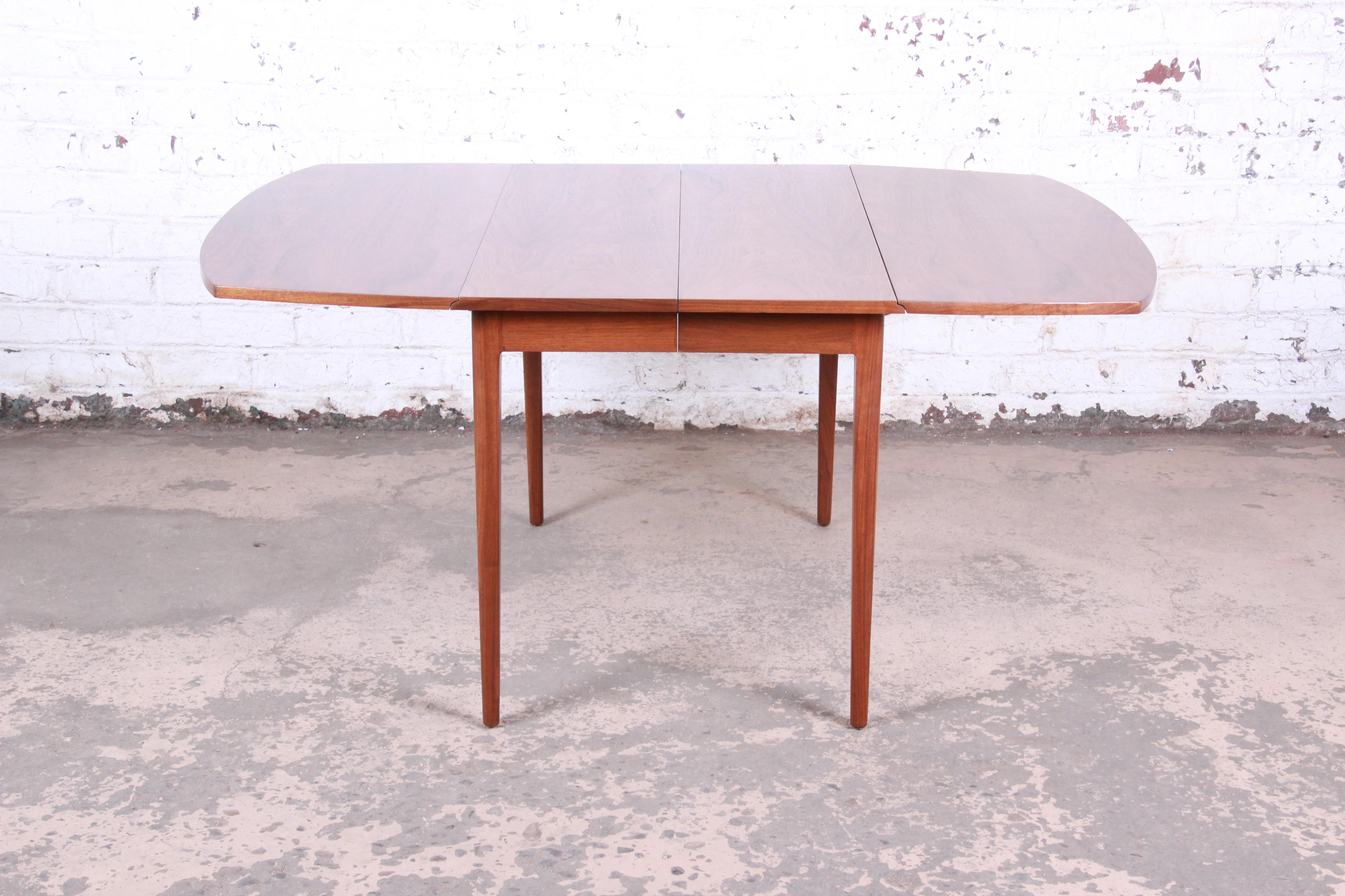 Mid-20th Century Kipp Stewart for Drexel Declaration Midcentury Walnut Extension Dining Table