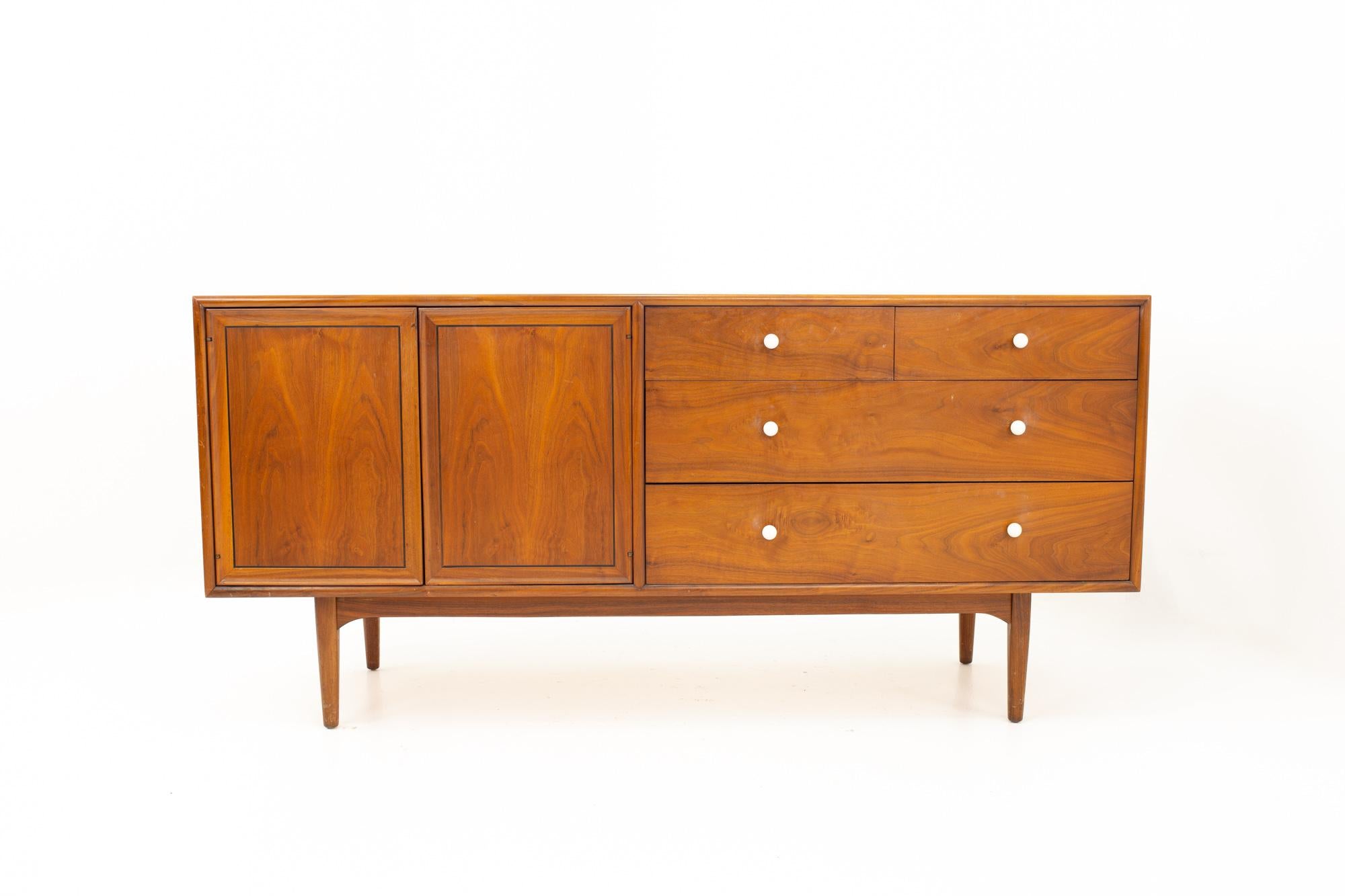 Kipp Stewart for Drexel Declaration Mid Century Walnut Lowboy Dresser

Dresser measures: 66 wide x 20 deep x 31 high

This price includes getting this piece in what we call Restored Vintage Condition. That means the piece is permanently fixed