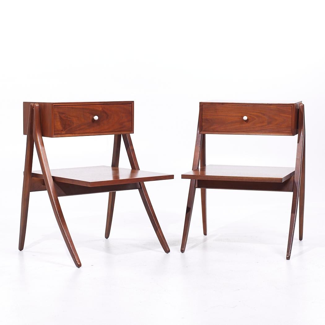 Kipp Stewart for Drexel Declaration Mid Century Walnut Nightstands - Pair

Each nightstand measures: 20.75 wide x 22 deep x 28 inches high

All pieces of furniture can be had in what we call restored vintage condition. That means the piece is