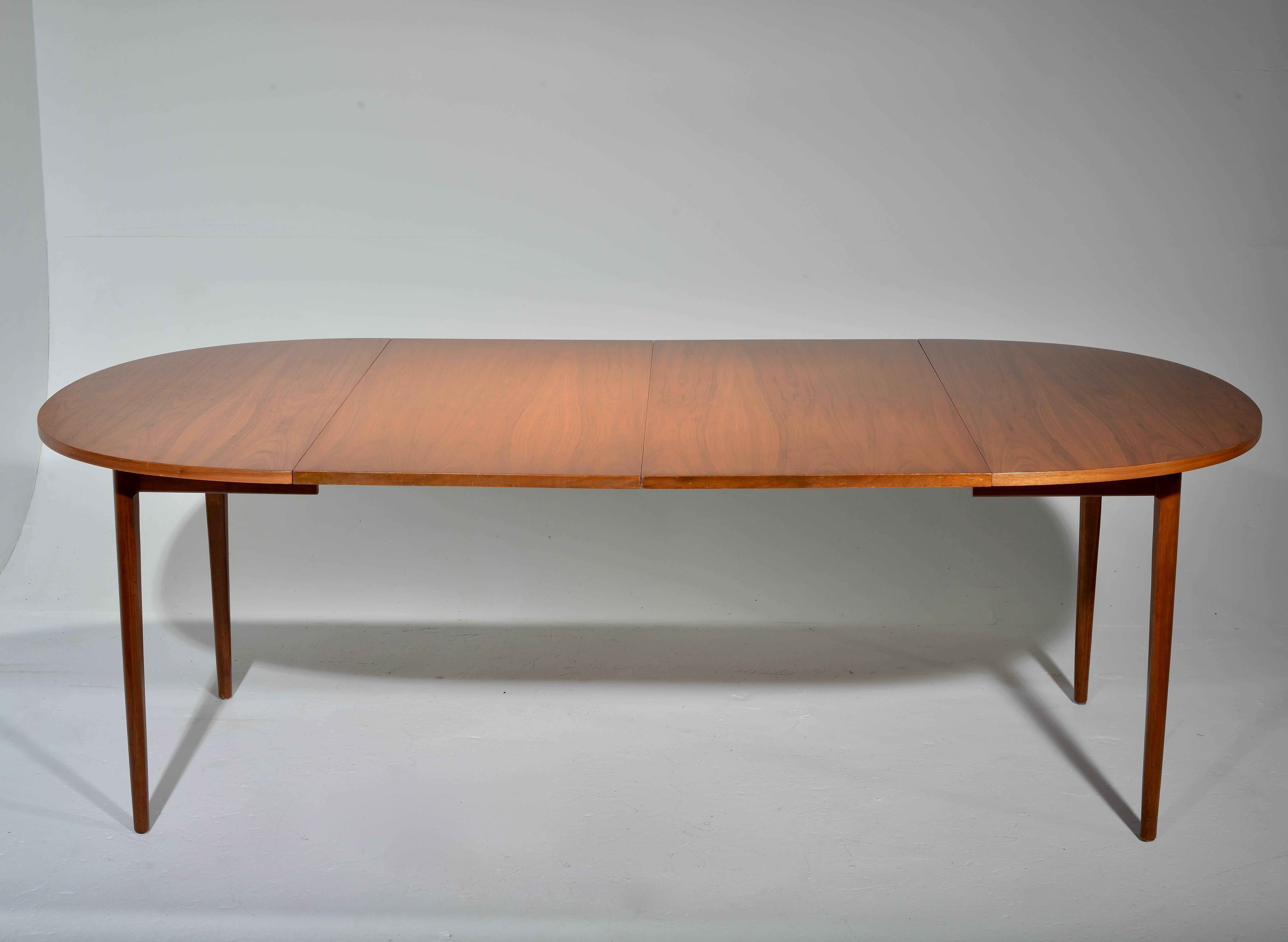 Kipp Stewart for Drexel 'Declaration' Round Extending Dining Table in Walnut In Excellent Condition In Los Angeles, CA