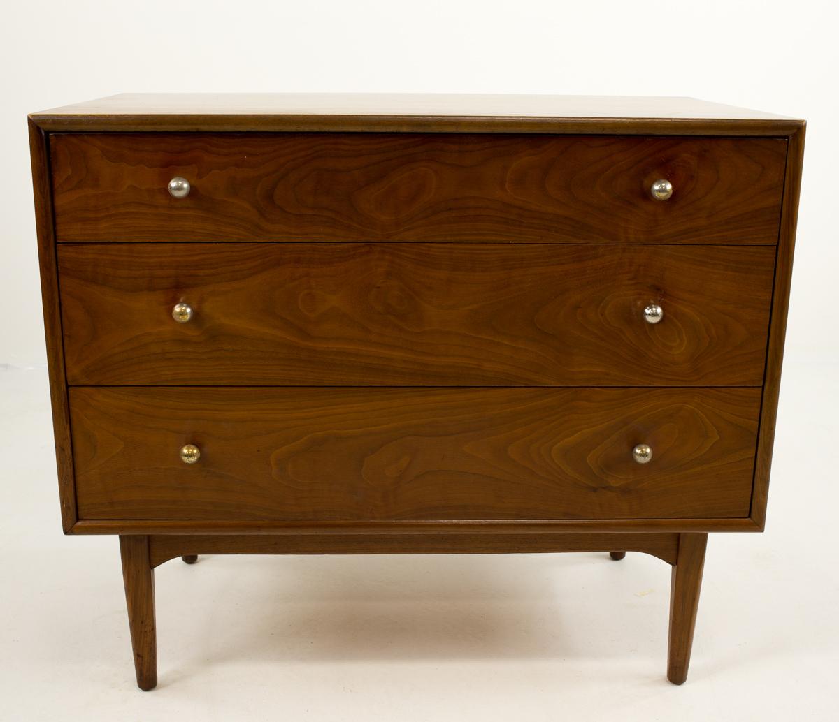 Kipp Stewart for Drexel declaration small 3 drawer dresser chest
Dresser measures: 36 wide x 21 deep x 31.25 inches high

?All pieces of furniture can be had in what we call restored vintage condition. That means the piece is restored upon