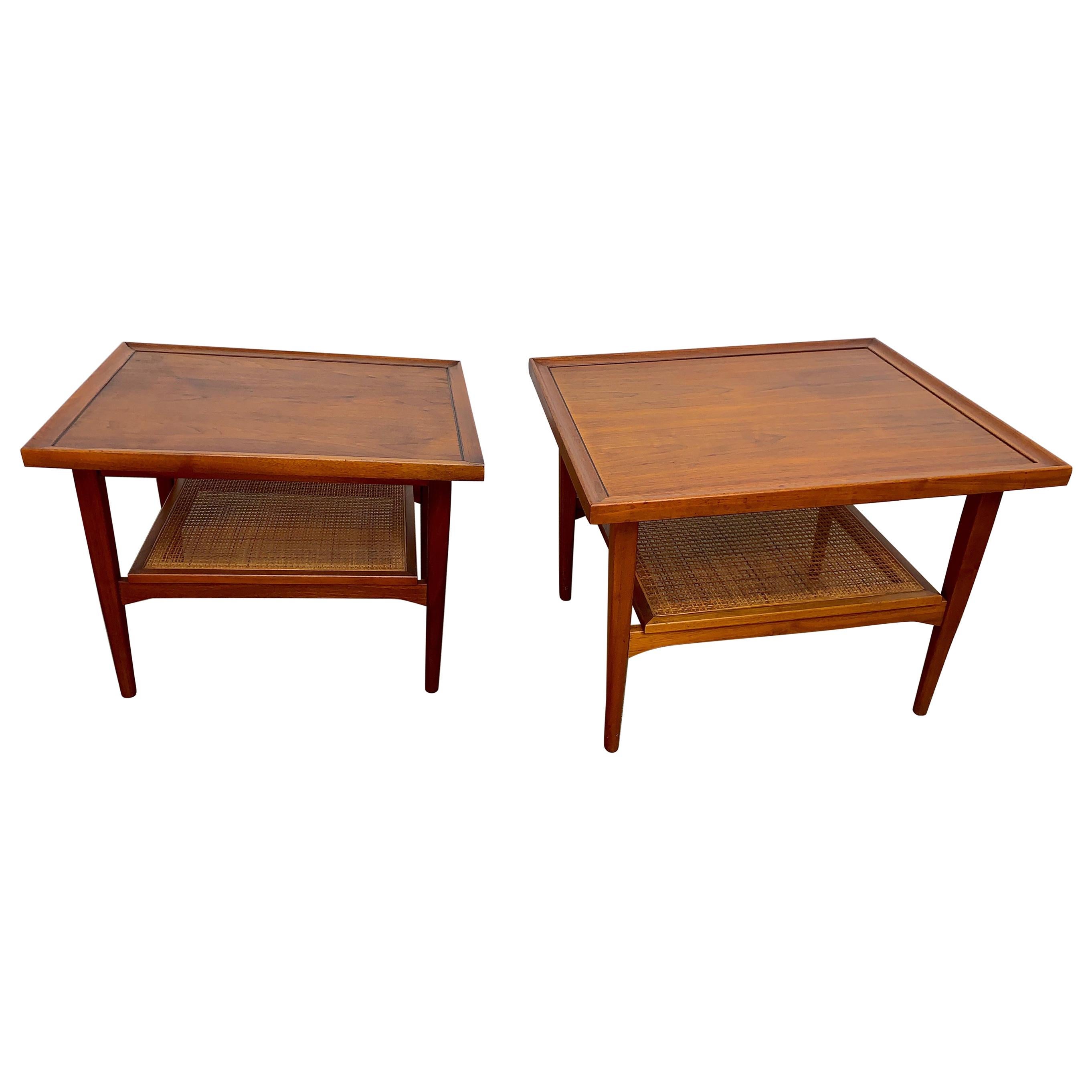 Beautiful American walnut with woven cane shelf end tables by Drexel Declaration.
