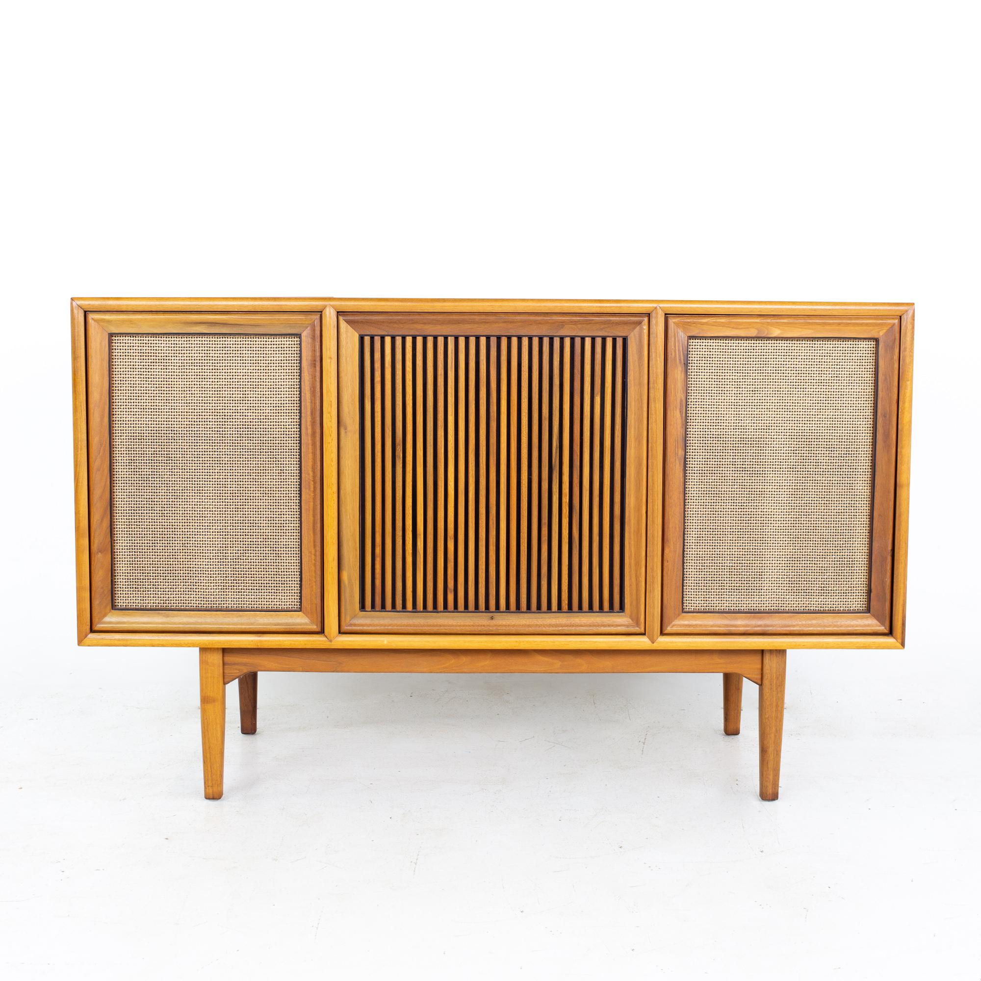 Kipp Stewart for Drexel Declarations Motorola mid century walnut stereo console
Console measures: 50.5 wide x 20 deep x 31 inches high

All pieces of furniture can be had in what we call restored vintage condition. That means the piece is