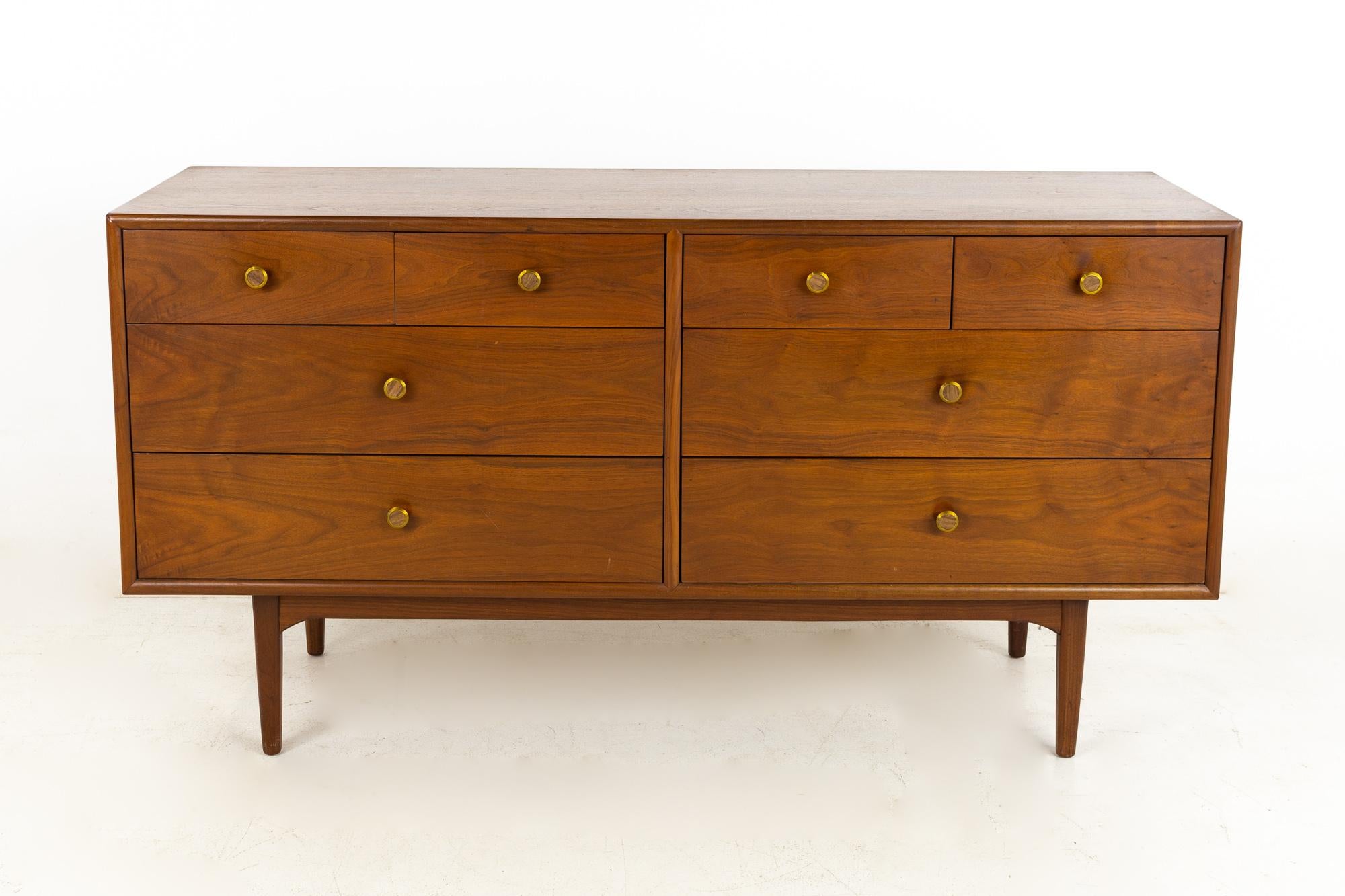 Kipp Stewart for Drexel mid century walnut 8 drawer lowboy dresser

This dresser measures: 60 wide x 20 deep x 31 inches high

All pieces of furniture can be had in what we call restored vintage condition. That means the piece is restored upon