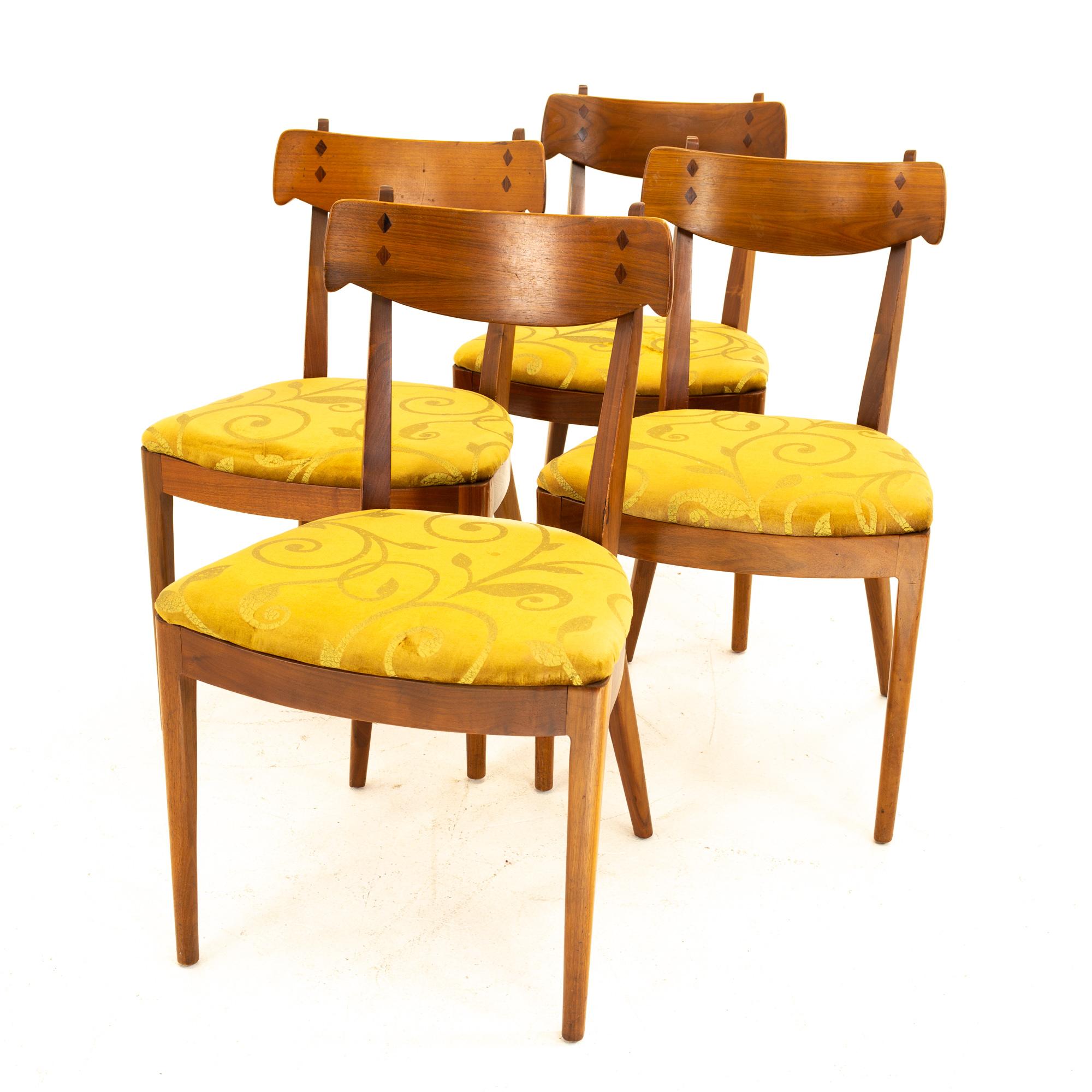 Kipp Stewart for Drexel mid century walnut dining chairs - Set of 4 
Each chair measures: 20 wide x 18 deep x 32 high

All pieces of furniture can be had in what we call restored vintage condition. That means the piece is restored upon purchase