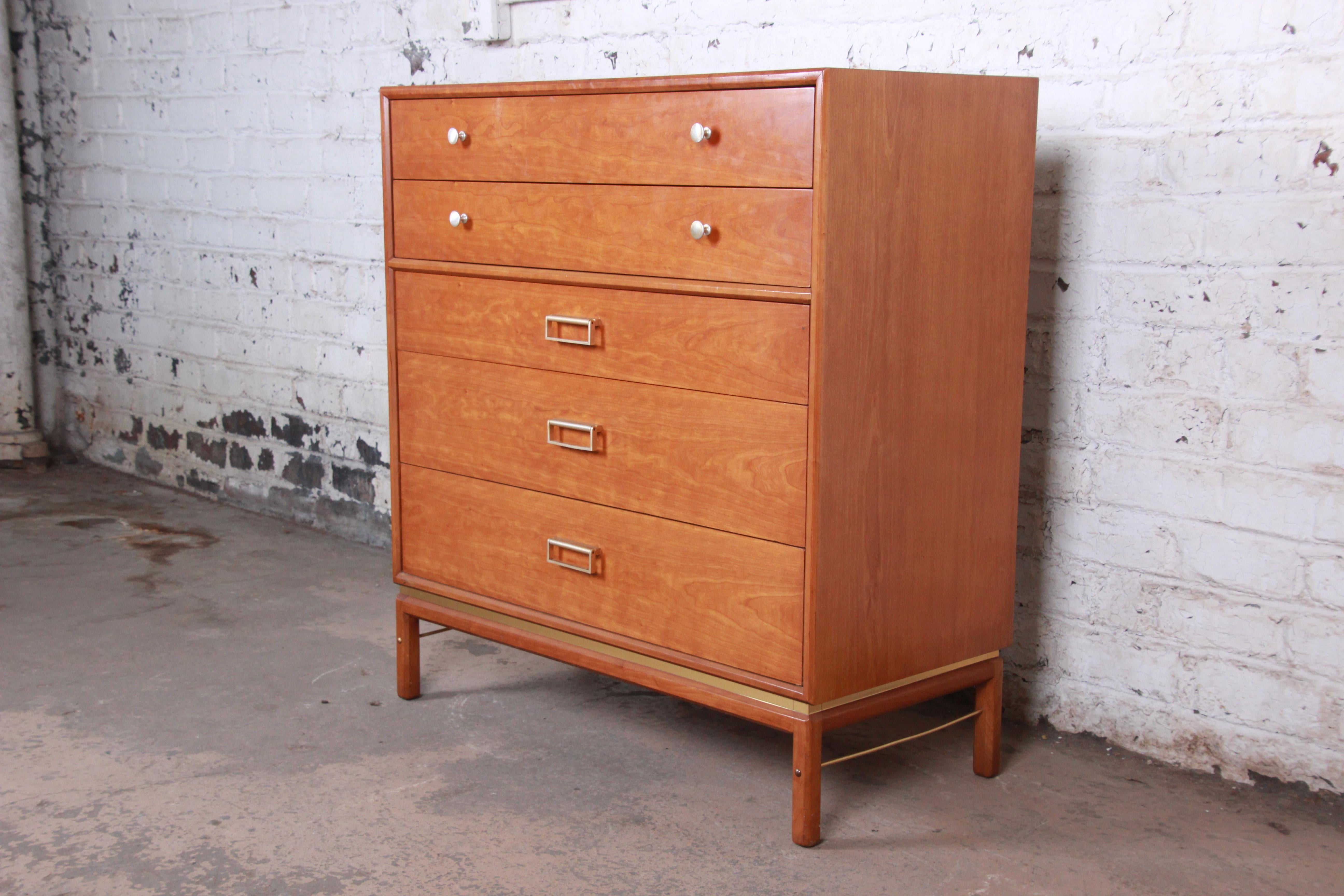 Offering a very nice Kipp Stewart for Drexel sun coast Mid-Century Modern highboy dresser. The dresser has a beautiful cherrywood grain with five large drawers that opens and close smoothly. It has nice original aluminum pulls with drawer dividers