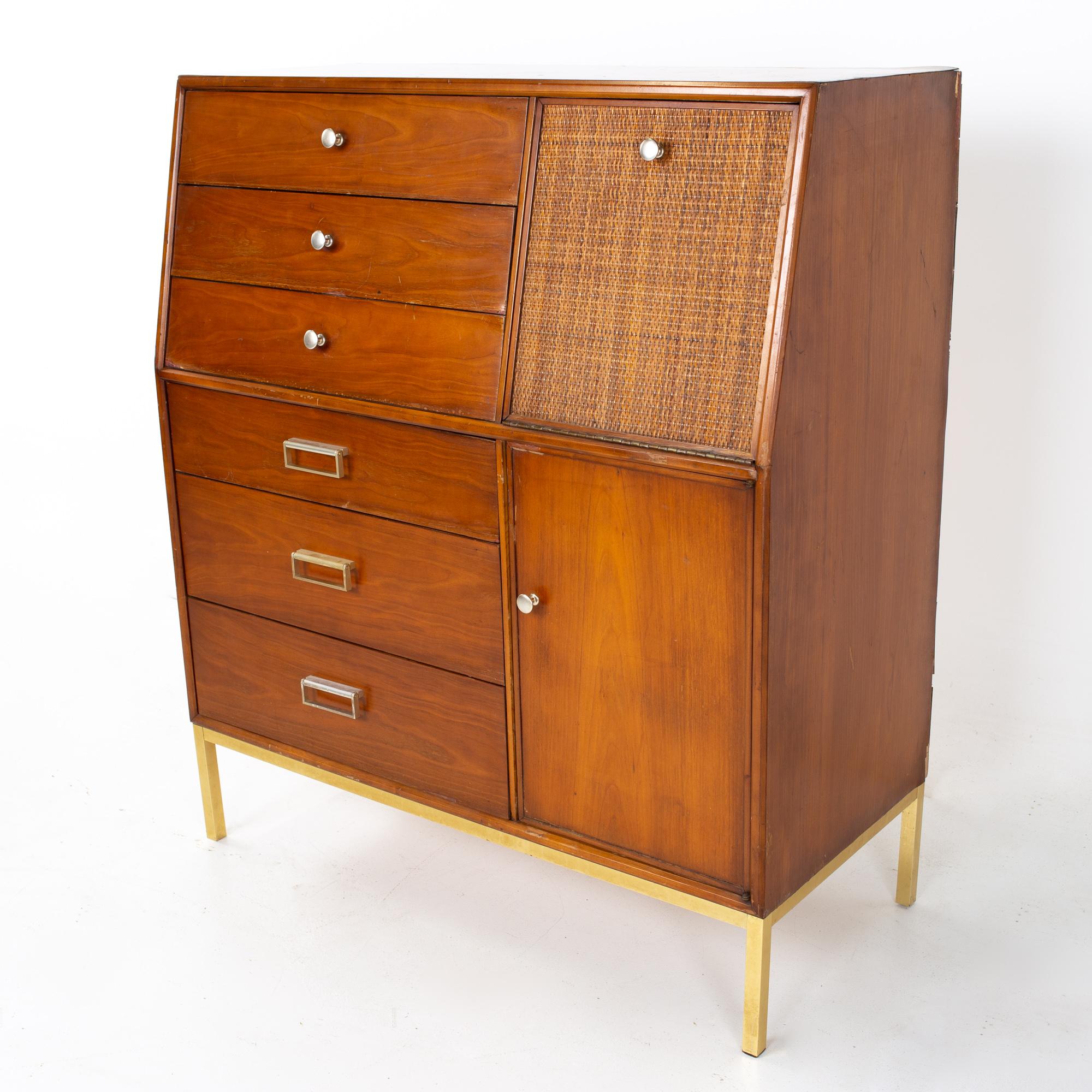 Kipp Stewart for Drexel Suncoast mid century walnut brass and cane gentleman's chest highboy dresser
Dresser measures: 40 wide x 18 deep x 46 inches high

All pieces of furniture can be had in what we call restored vintage condition. That means