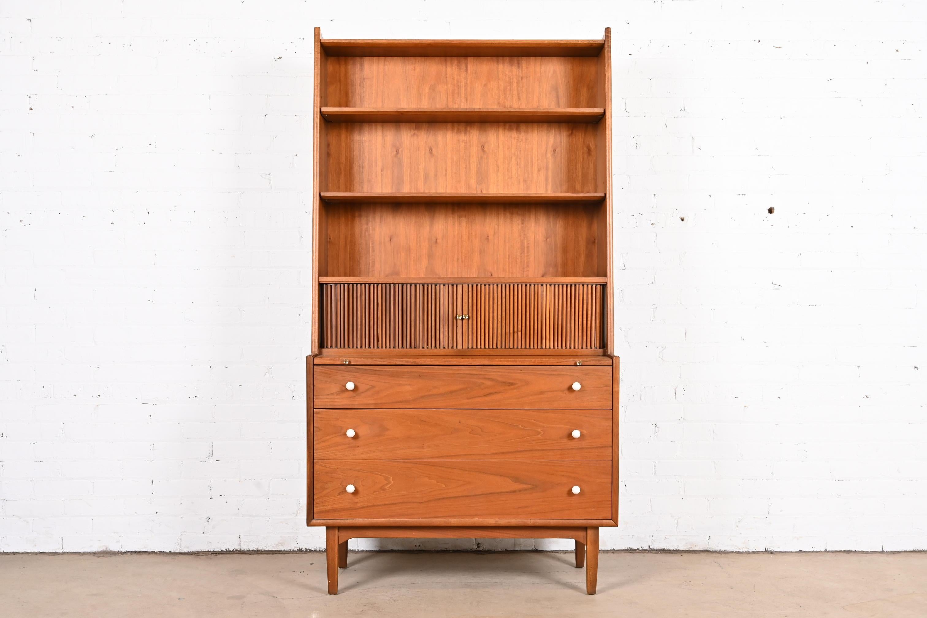 An exceptional Mid-Century Modern bureau with tambour door secretary desk and bookcase
By Kipp Stewart for Drexel, 