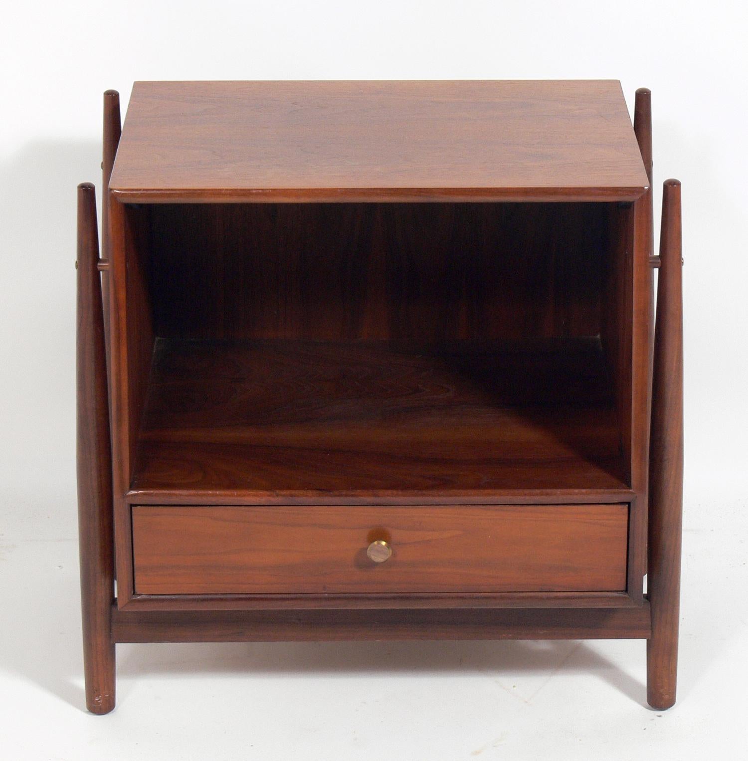 Pair of modern walnut nightstands, designed by Kipp Stewart for Drexel, circa 1960s. They are a versatile size and can be used as nightstands or as end or side tables. They are currently being refinished and can be refinished in your choice of