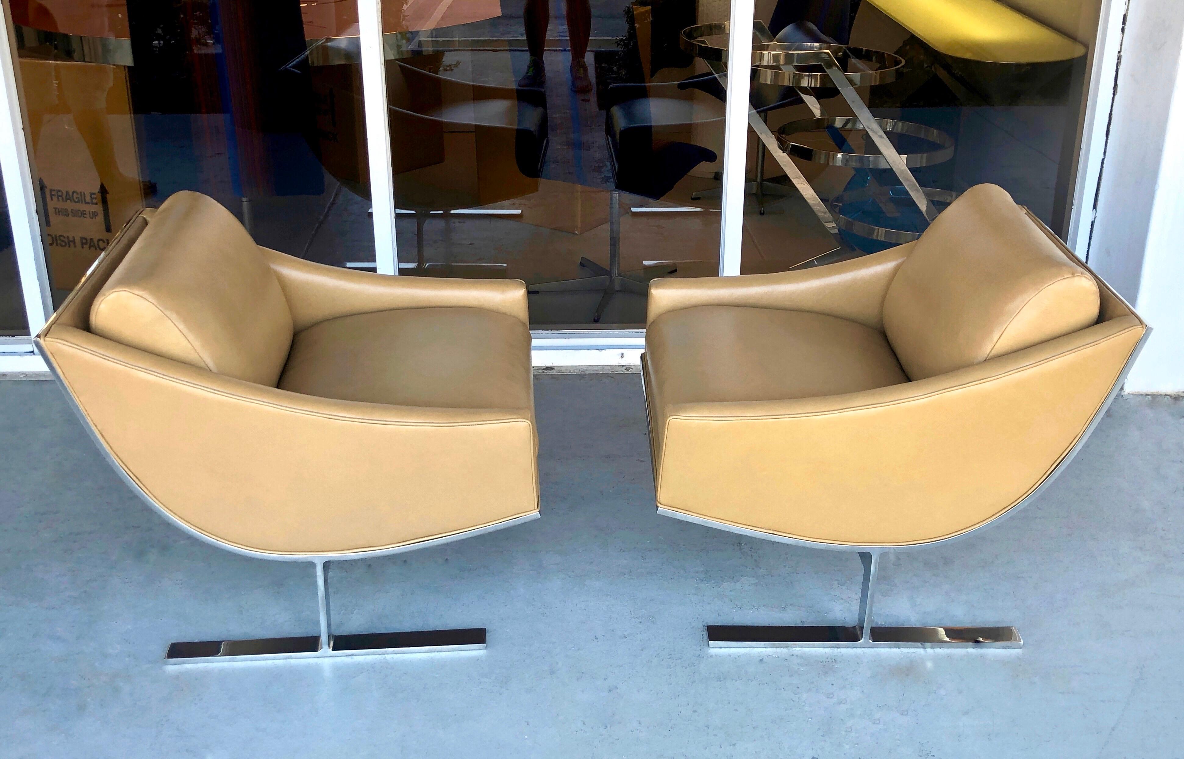 A pair of wonderful chairs by Kipp Stewart for Directional. Solid stainless steel frames with new soft leather upholstery. Super stylish low profile design.