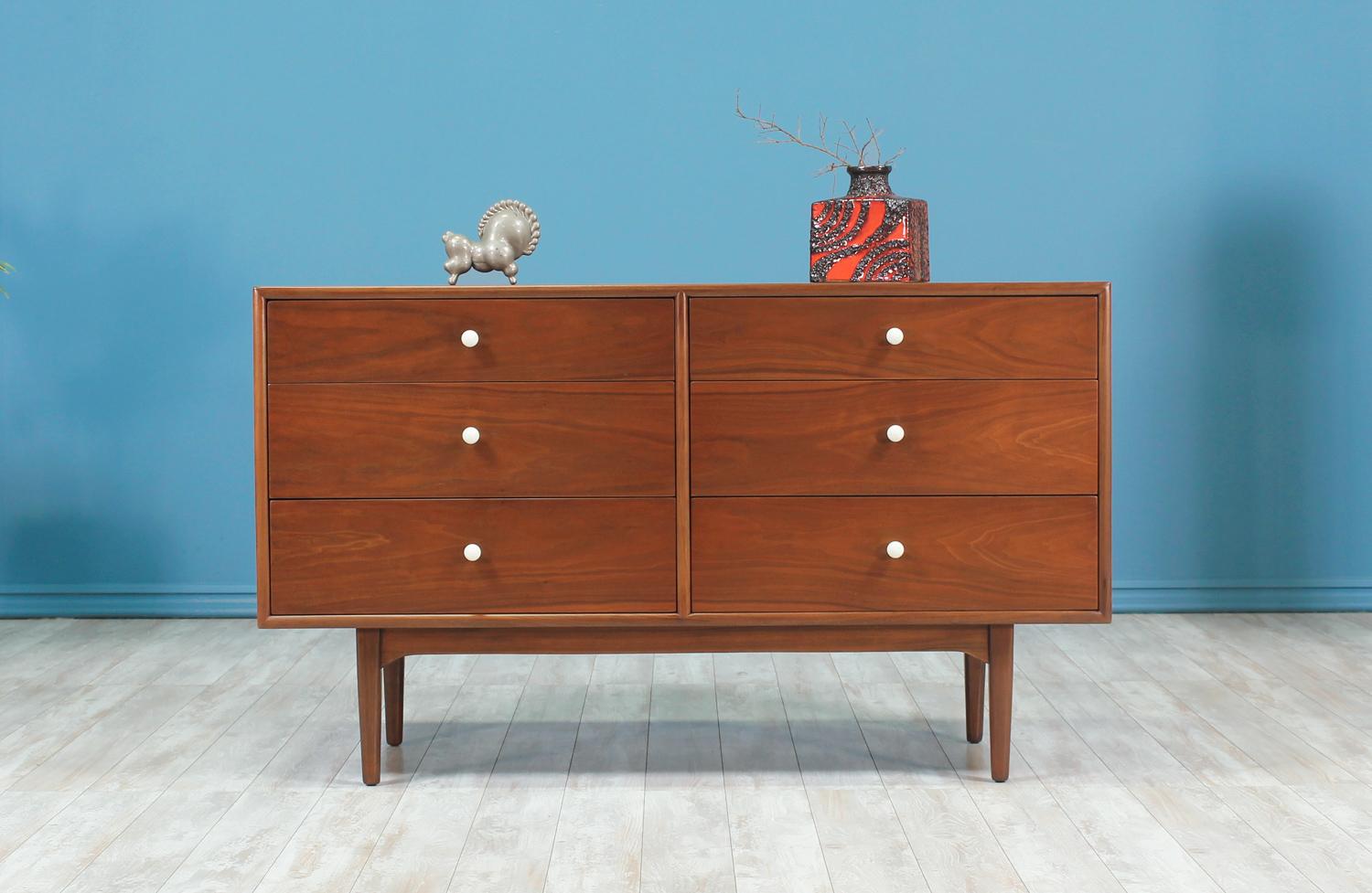Splendid dresser designed by Kipp Stewart & Stewart MacDougall for Drexel’s Declaration line in the United States circa 1960’s. This beautiful dresser has been recently refinished by our expert team keeping its original pieces. It features six
