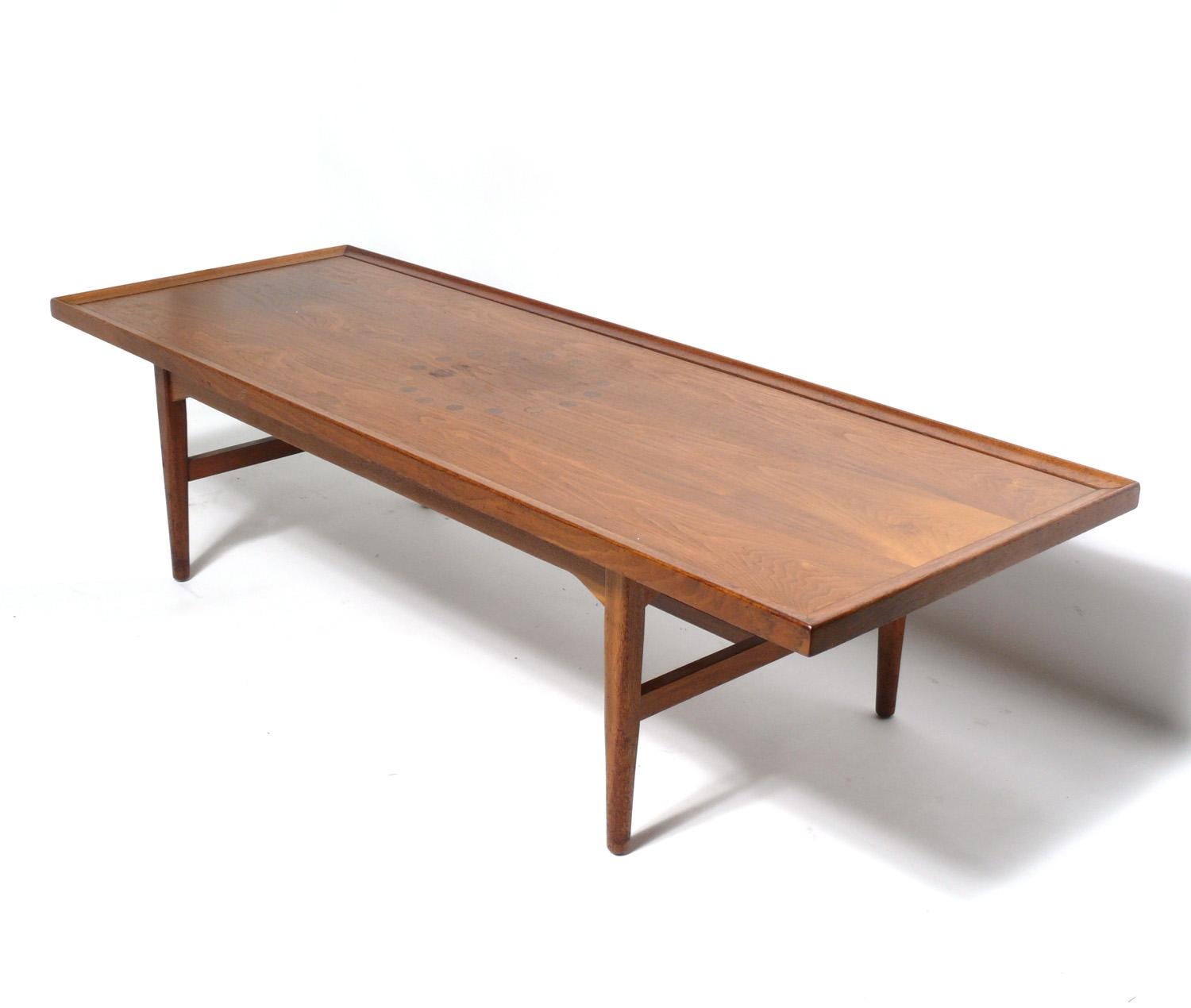 Mid-Century Modern coffee table, designed by Kipp Stewart for Drexel Declaration, American, circa 1950s.