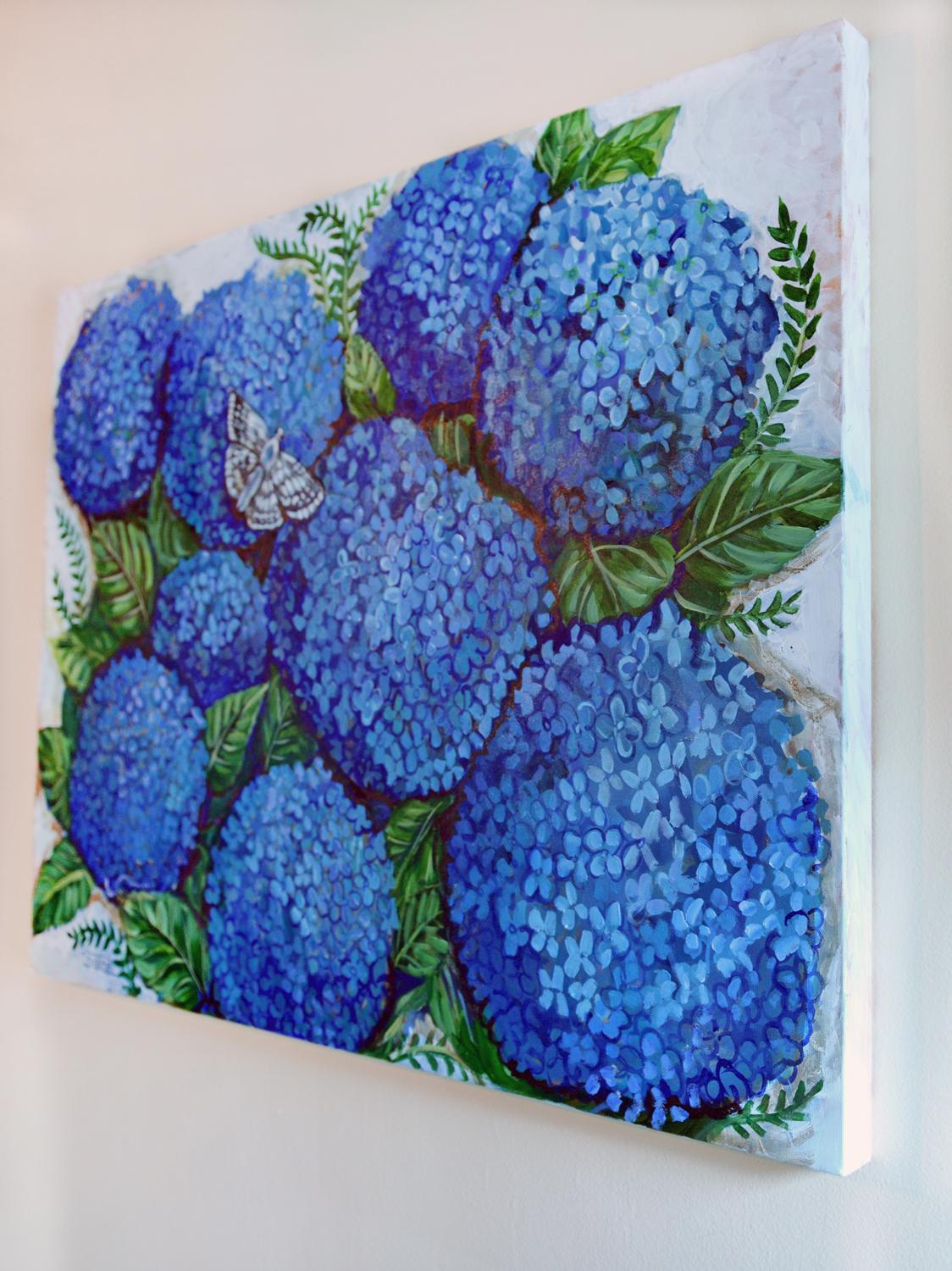 <p>Artist Comments<br />Large clusters of hydrangeas burst with vibrant blue hues, while a delicate butterfly perches on top, infusing the scene with life and lightness. Artist Kira Yustak notes that walking into her garden during the summer,