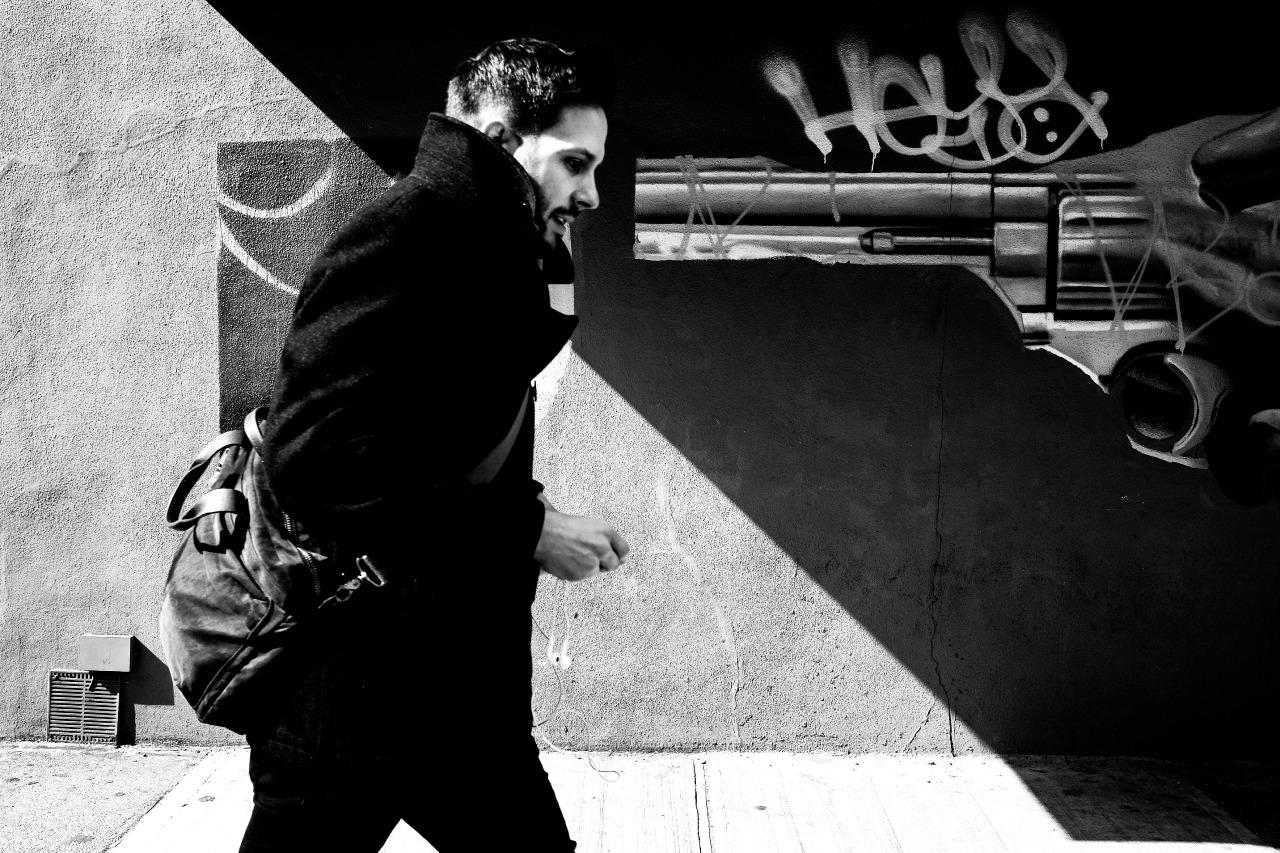 Gun, Brooklyn - Black and White Photograph, Graffiti and Young Man in Brooklyn