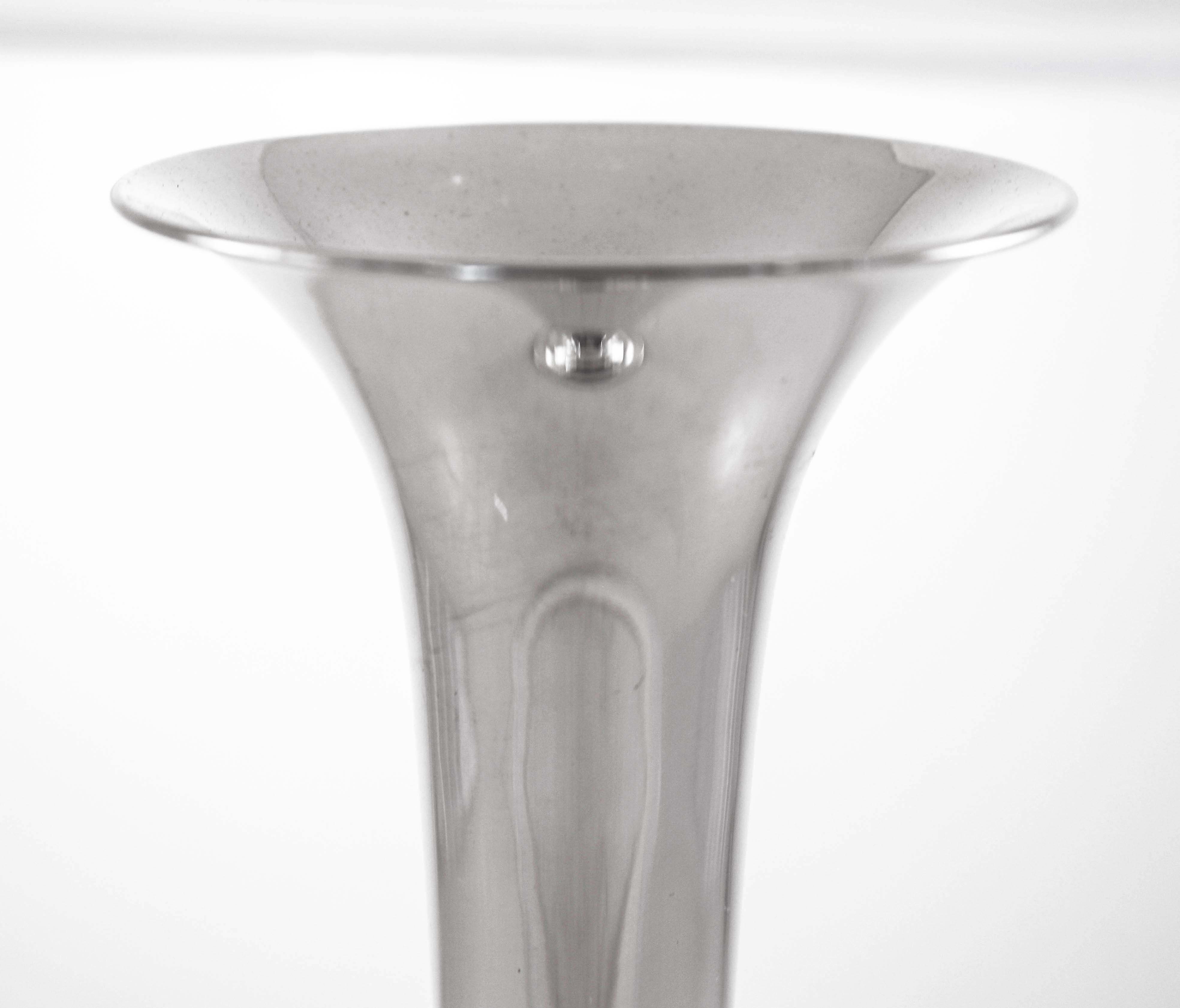 This sterling silver bud-vase by S.Kirk and Sons is understated and elegant. A simple shape with no etchings or design, it’s meant to blend into any decor — from ornate to modern this vase works. The perfect piece for those places that need a little