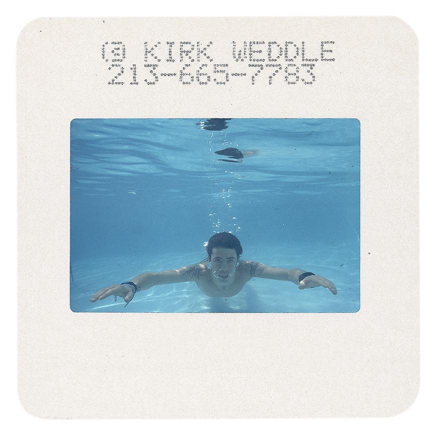 Signed print taken from an original color slide of Dave Grohl, now from the Foo Fighters, then from Nirvana by Kirk Weddle. This slide was taken during the famous swimming pool sessions with Nirvana for the release of Nevermind in 1991, and