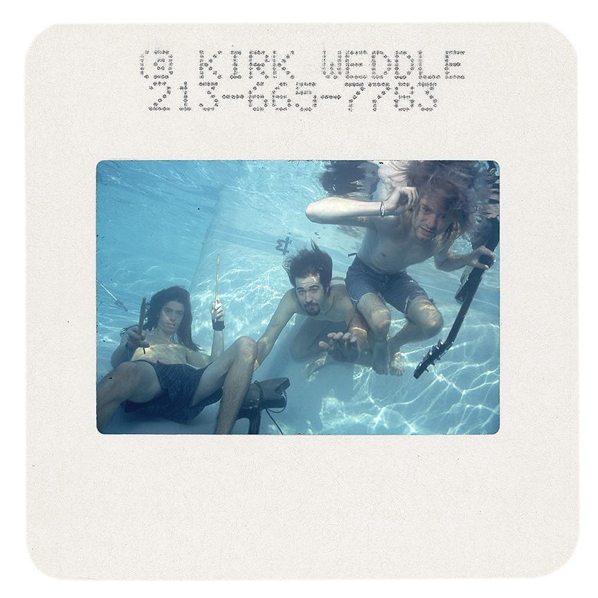 Signed print taken from an original color slide of Nirvana by Kirk Weddle. This slide was taken during the famous swimming pool sessions with Nirvana for the release of Nevermind in 1991, and photographed by Kirk to produce this series of