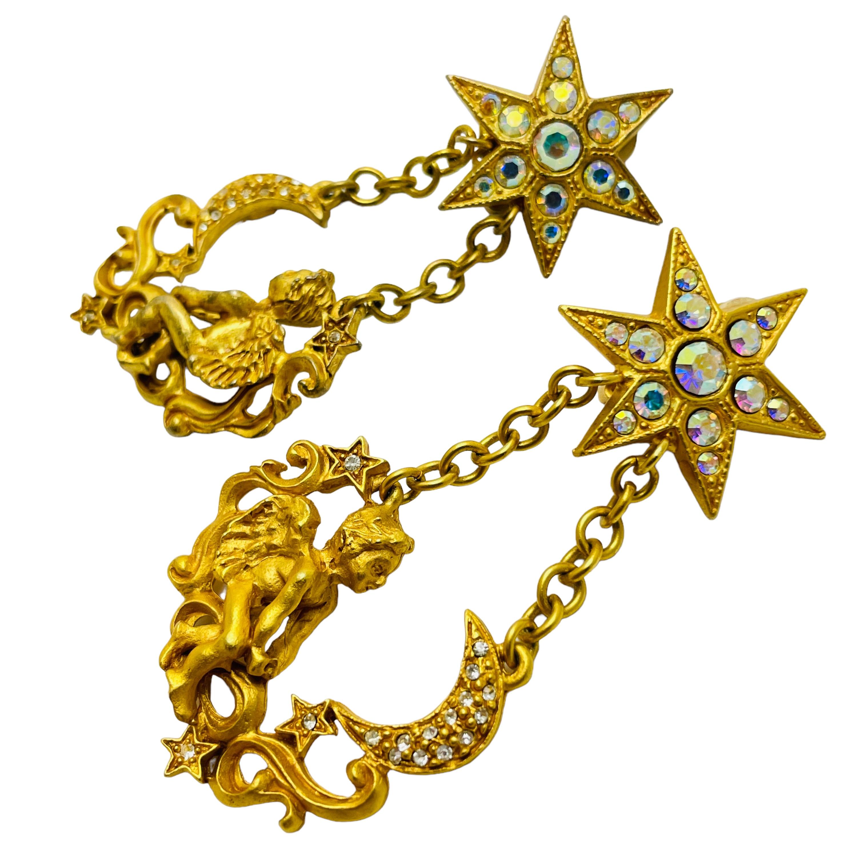 Women's or Men's KIRKS FOLLY gold cherub star moon dangle designer clip on earrings For Sale