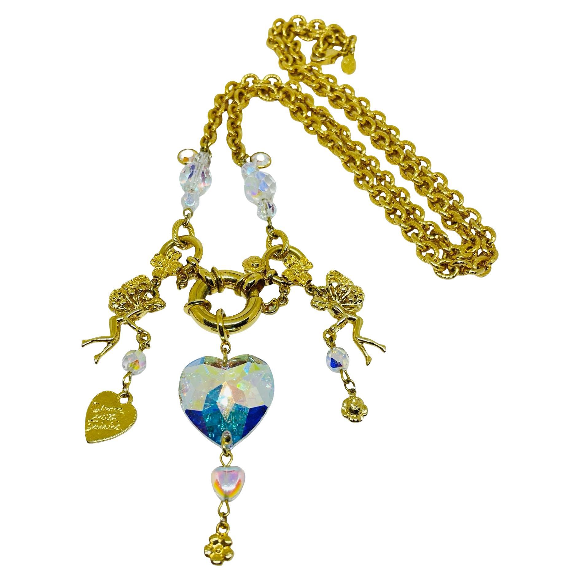 What does a heart necklace symbolize?