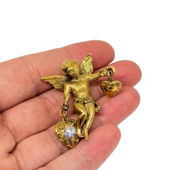 KIRKS FOLLY – Vintage-Brosche in Goldoptik mit Strasssteinen, Herz, Engel und Cherub